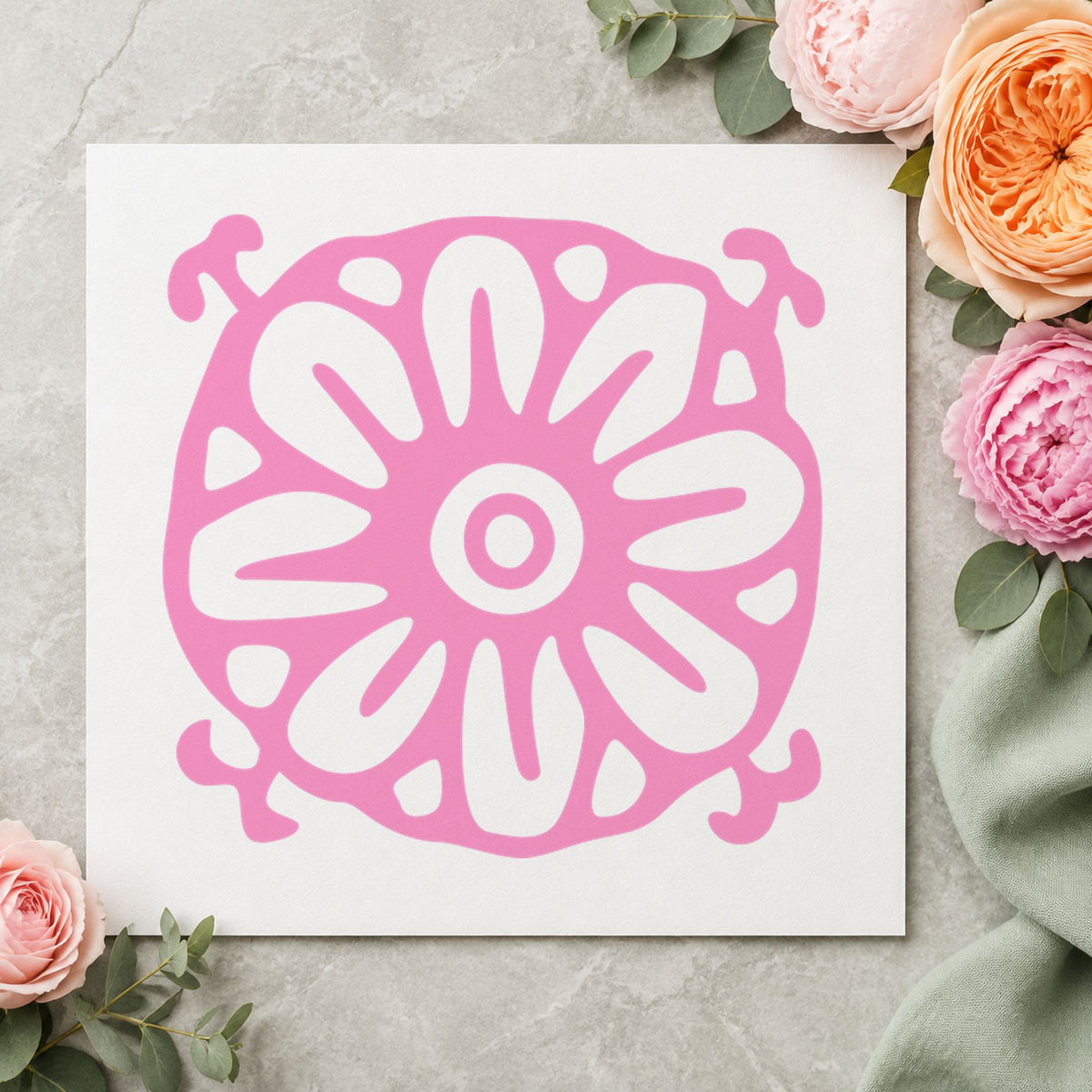 Square Flower Motif Rubber Stamp impression in pink ink on white paper in a styled craft setting.