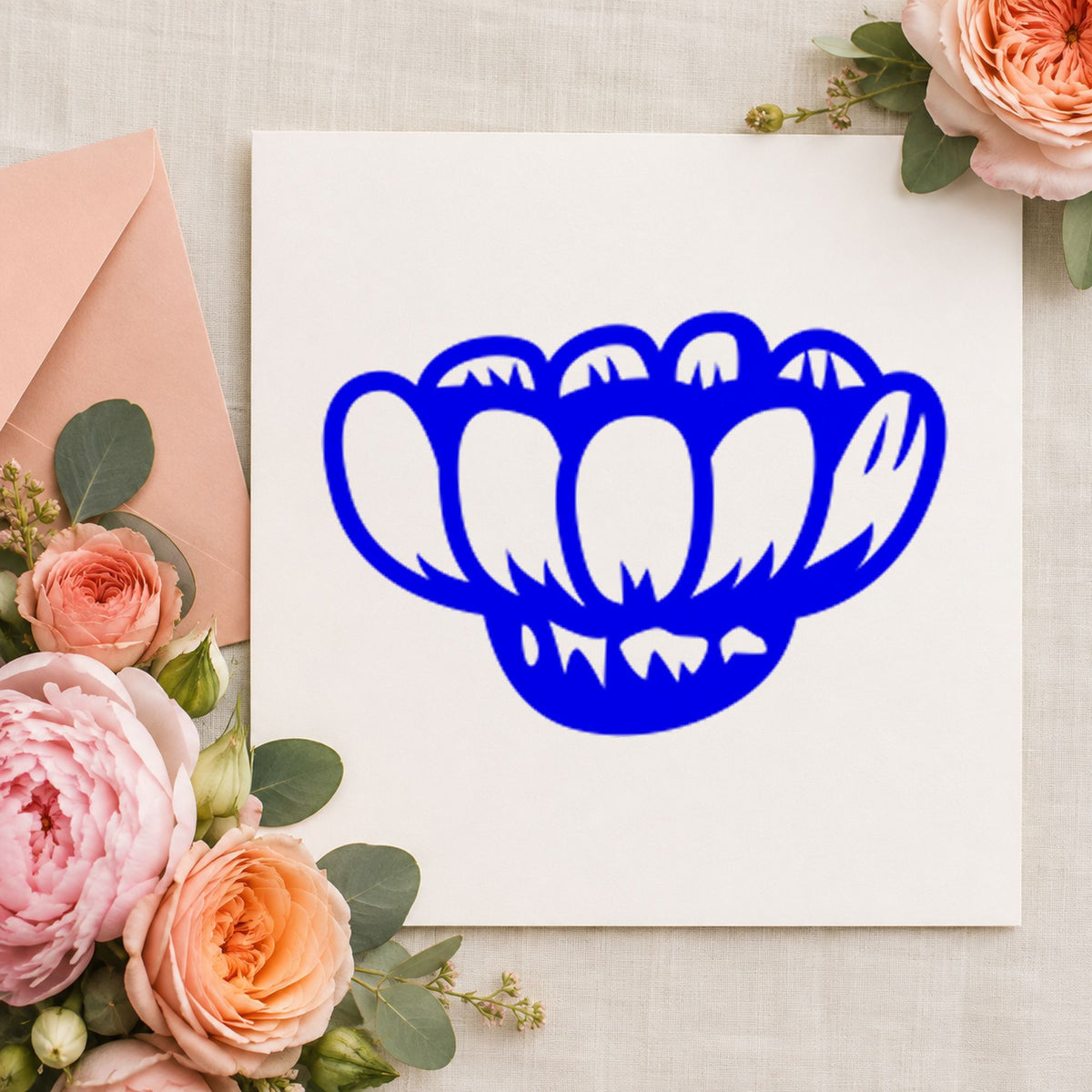 Sideways Daisy Rubber Stamp impression in blue ink on white paper in a styled craft setting.