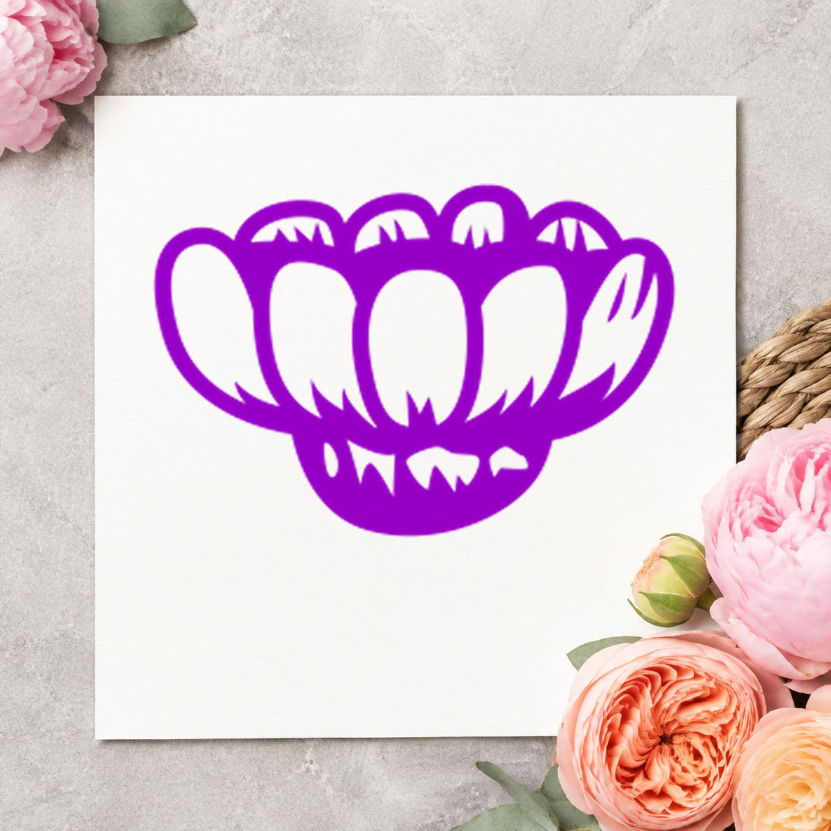 Sideways Daisy Rubber Stamp impression in purple ink on white paper in a styled craft setting.