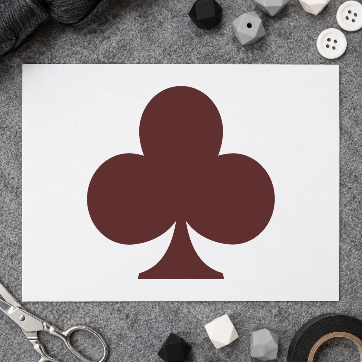 Playing Card Club Rubber Stamp impression in brown ink on white paper in a styled craft setting.