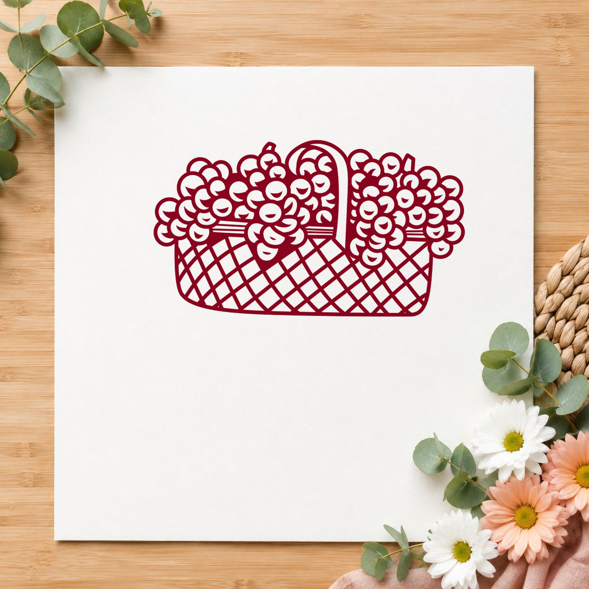 Basket of Flowers Rubber Stamp Large impression in burgundy ink on white paper in a styled craft setting.