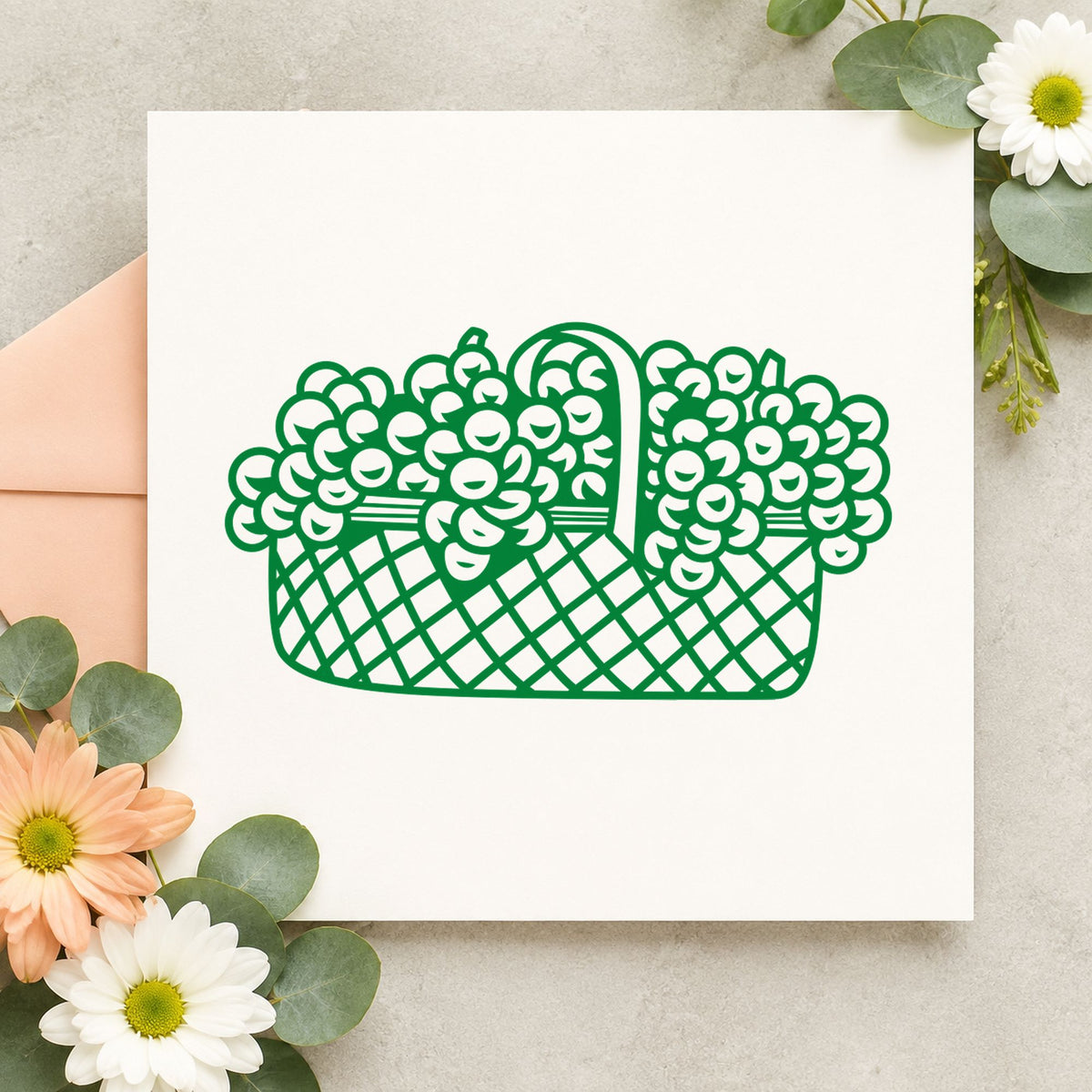 Basket of Flowers Rubber Stamp Large impression in green ink on white paper in a styled craft setting.