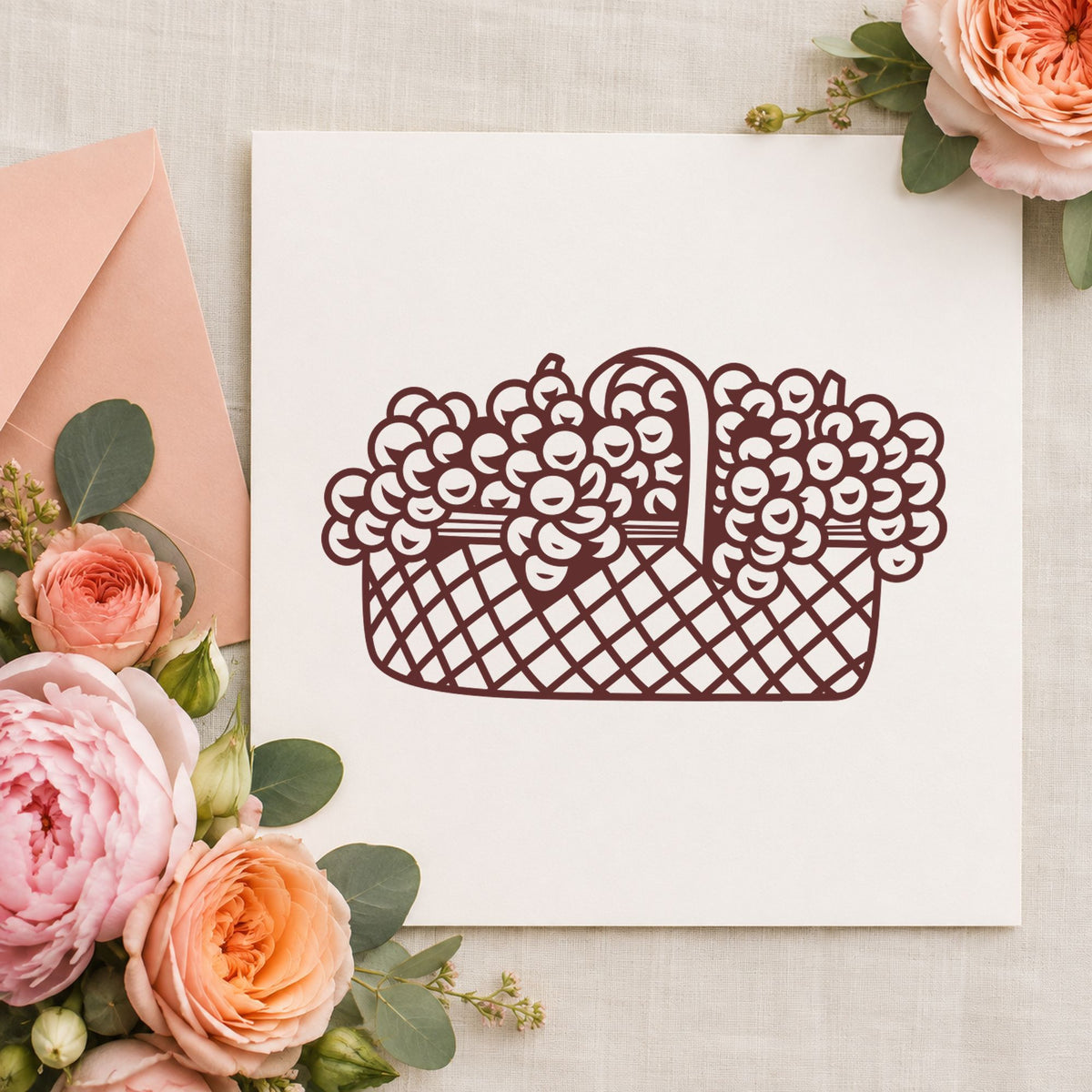 Basket of Flowers Rubber Stamp Large impression in brown ink on white paper in a styled craft setting.