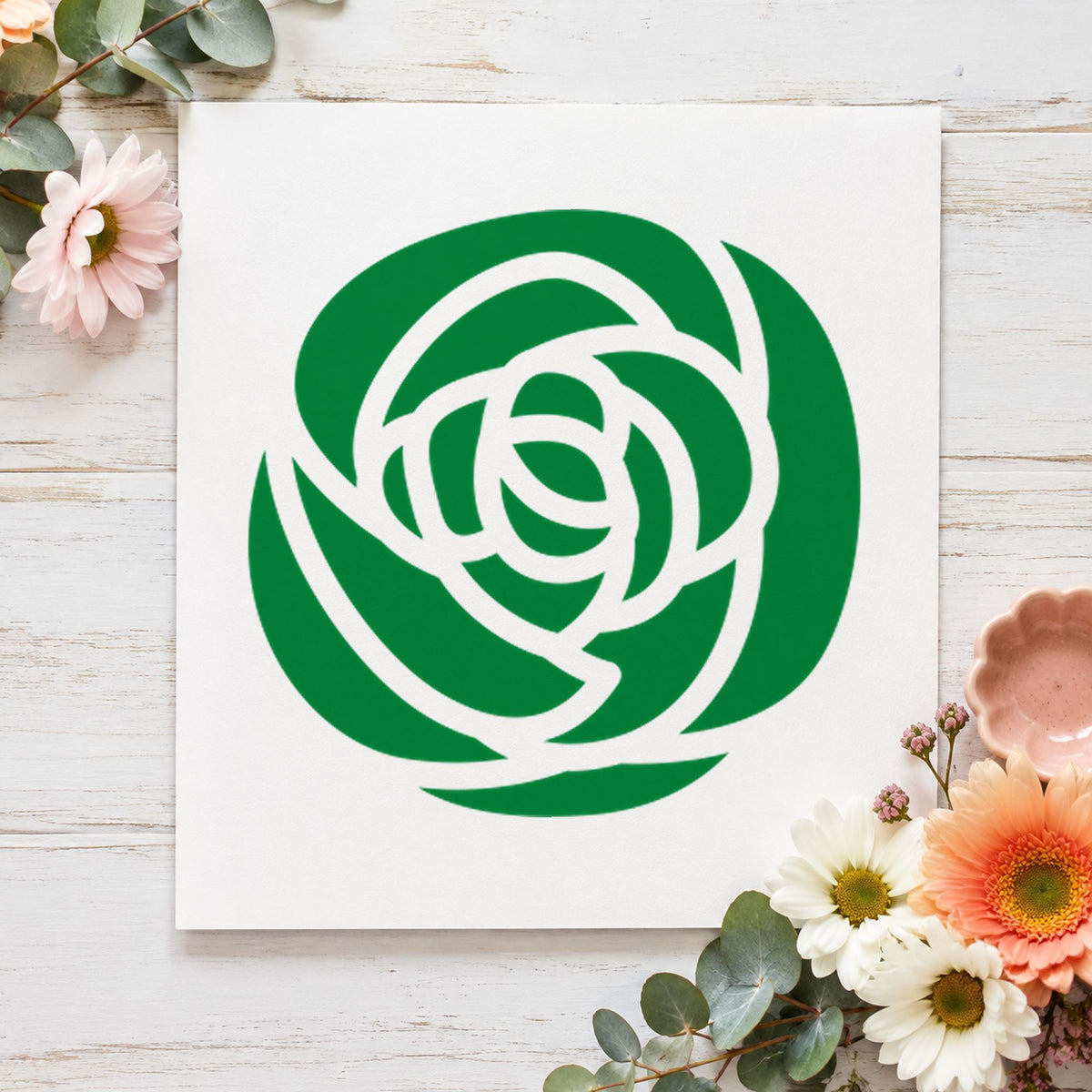 Single Solid Flower Rubber Stamp impression in green ink on white paper in a styled craft setting.