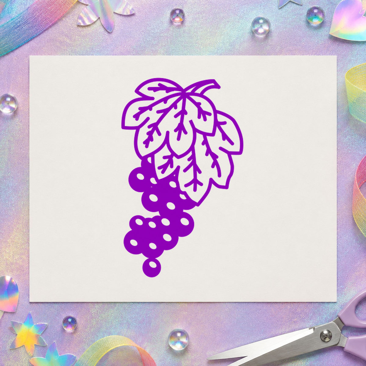 Grape Bunch on Vine Rubber Stamp impression in purple ink on white paper in a styled craft setting.