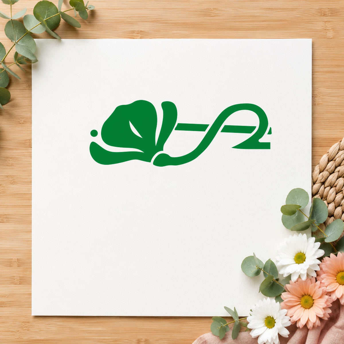 Left Flower Border Rubber Stamp impression in green ink on white paper in a styled craft setting.