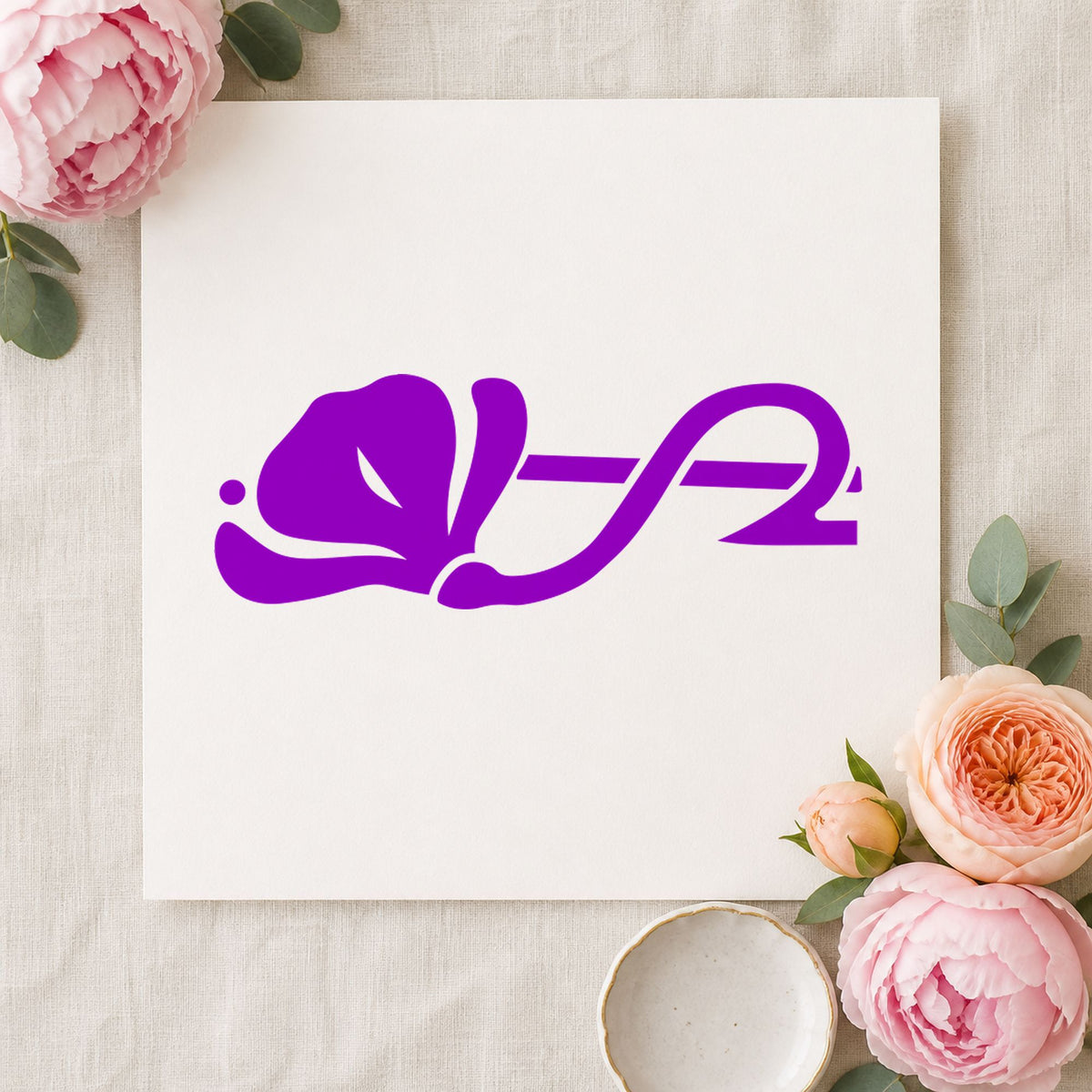 Left Flower Border Rubber Stamp impression in purple ink on white paper in a styled craft setting.