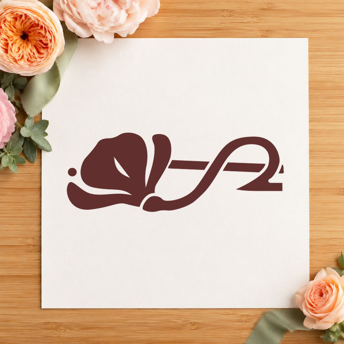 Left Flower Border Rubber Stamp impression in brown ink on white paper in a styled craft setting.