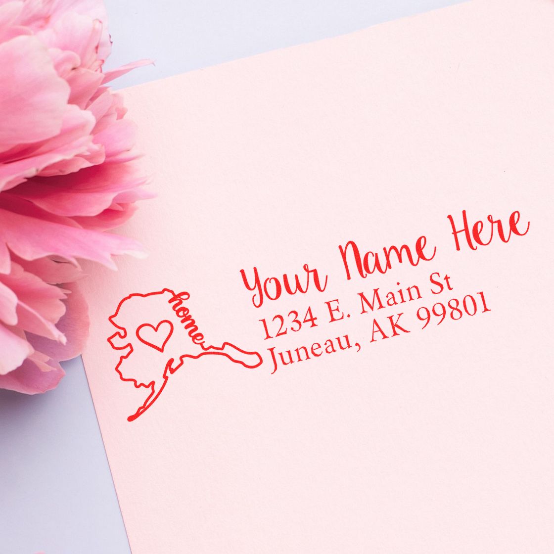Personalized Alaska return address rubber stamp with name and address for custom wedding or business mail.