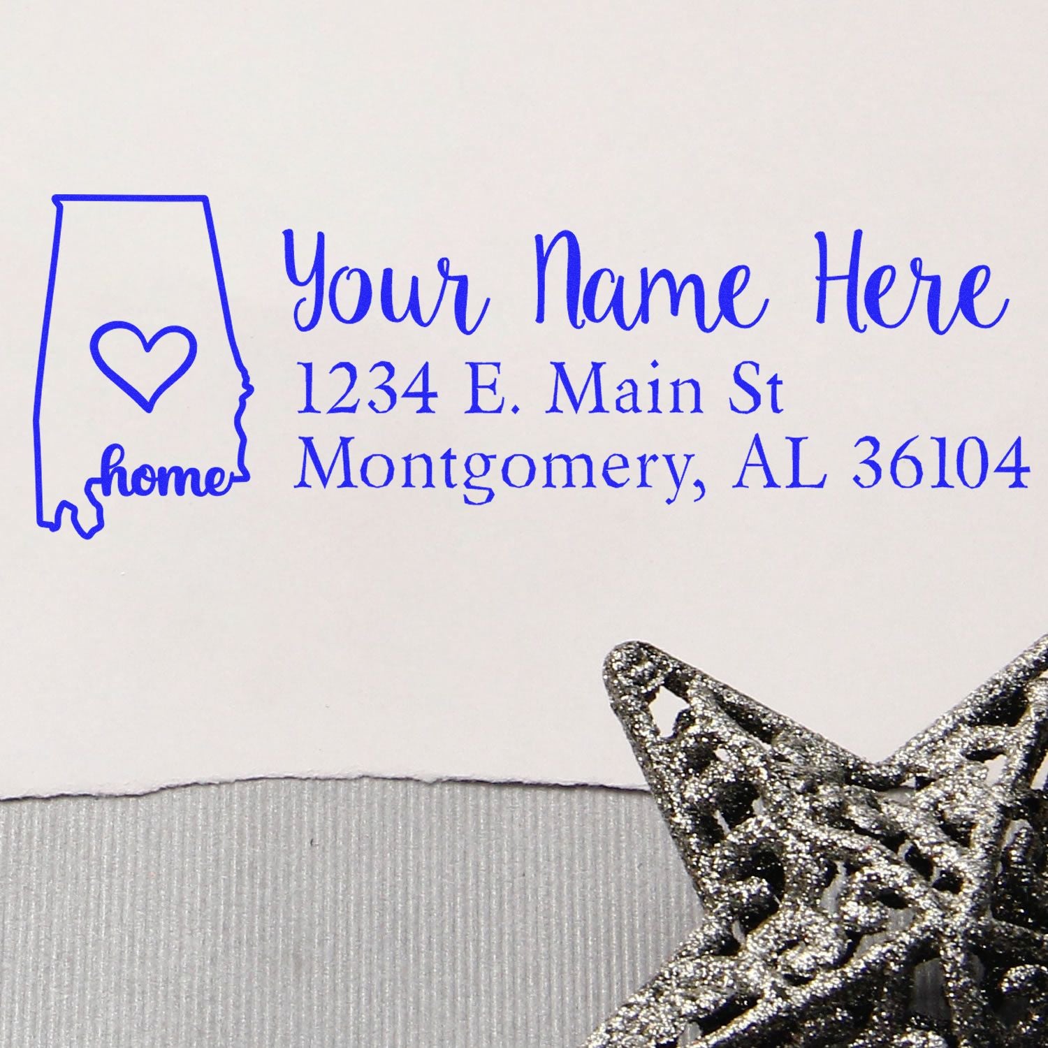 Custom Alabama return address rubber stamp with heart and home design, showing sample name and Montgomery, AL address.