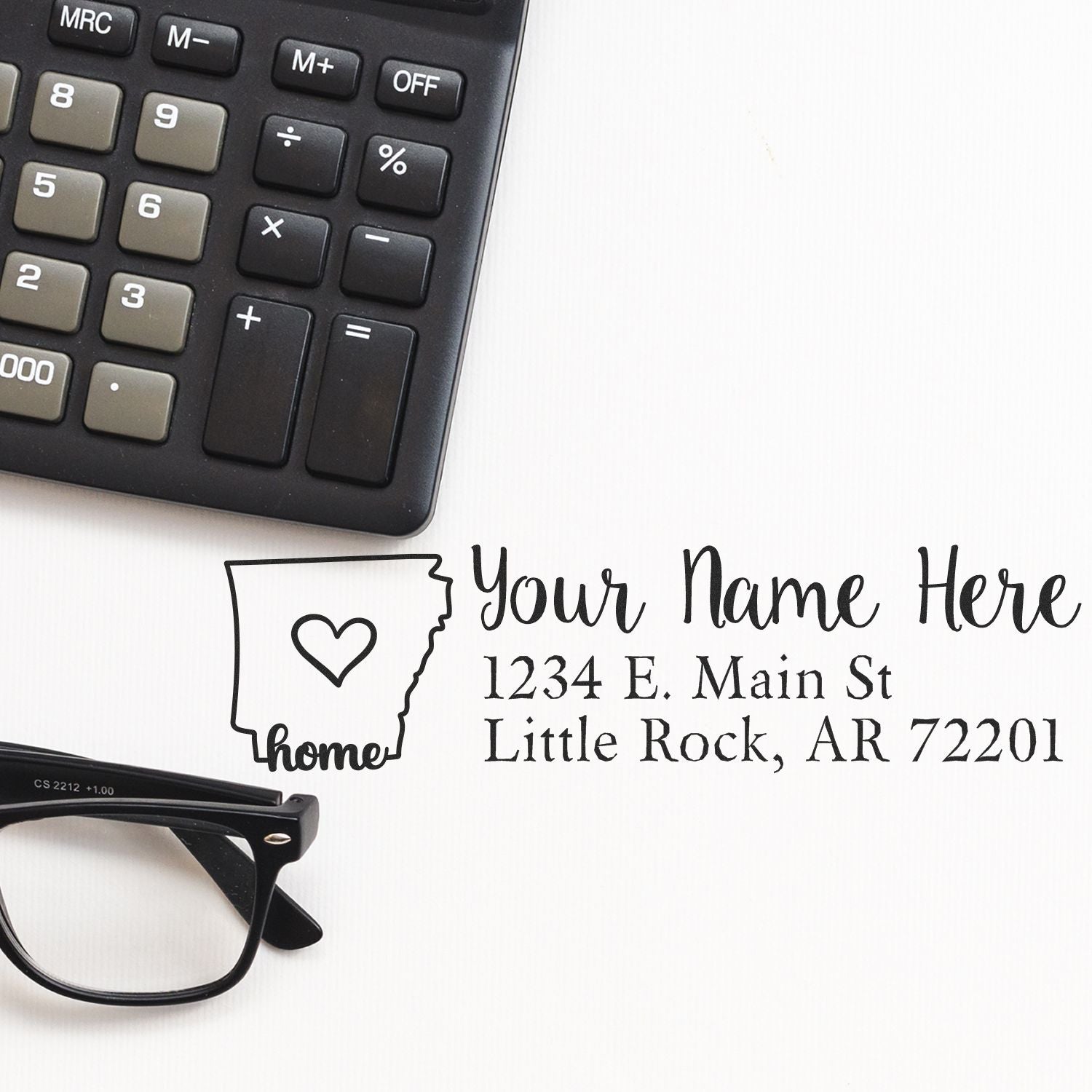 Custom return address rubber stamp design with Arkansas home icon, name, and Little Rock address for mailing.
