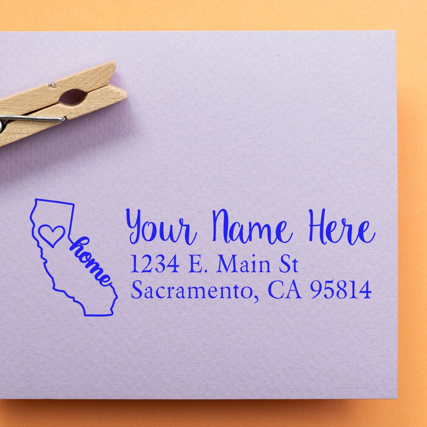 Custom California return address rubber stamp imprint with name and address sample, ideal for personalized mailing and stationery.
