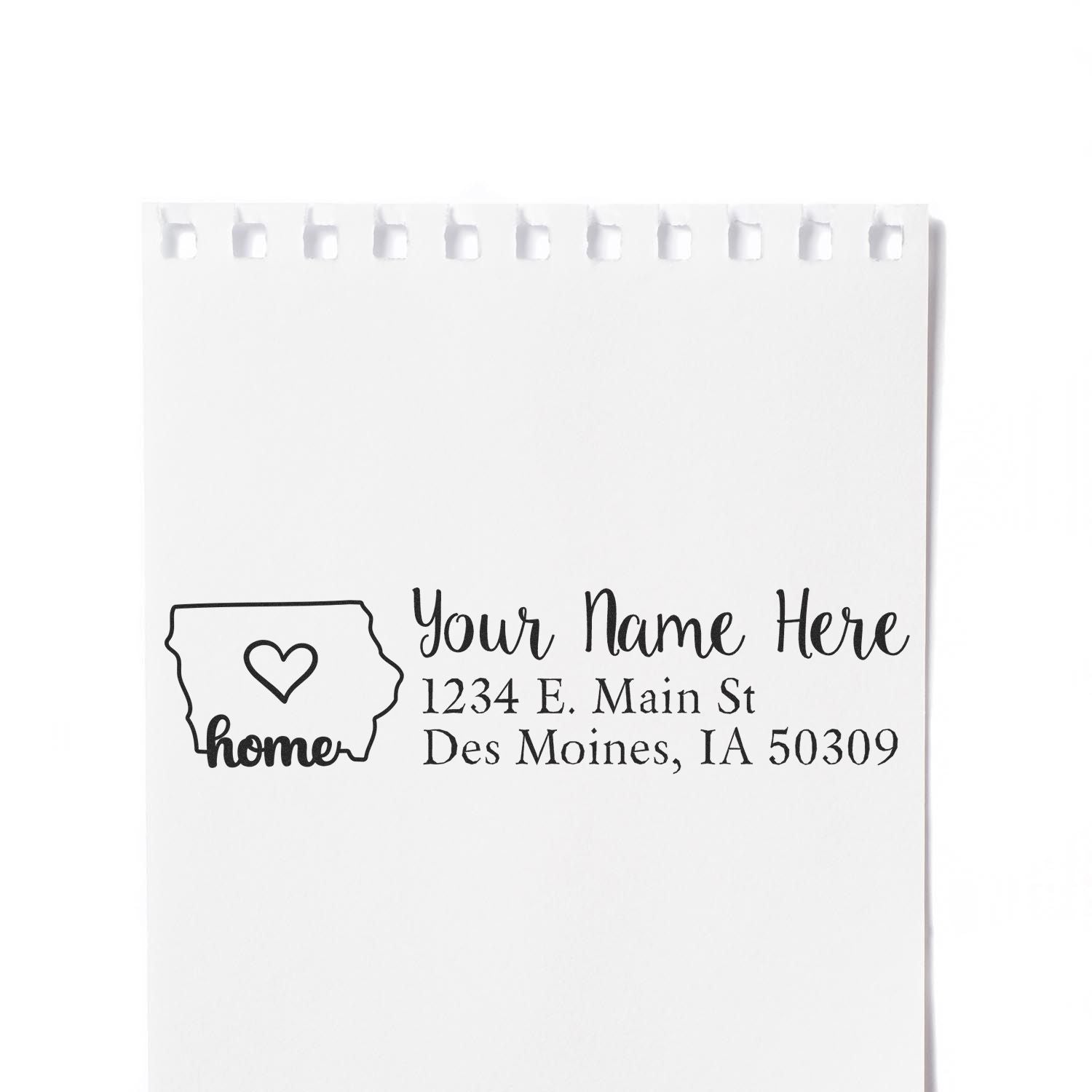 Personalized return address rubber stamp with Iowa home icon, heart, name, and mailing address for custom envelopes.