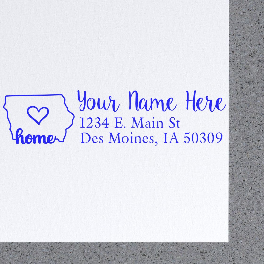 Custom return address rubber stamp with Iowa home outline, heart, and personalized name and address for mailing.