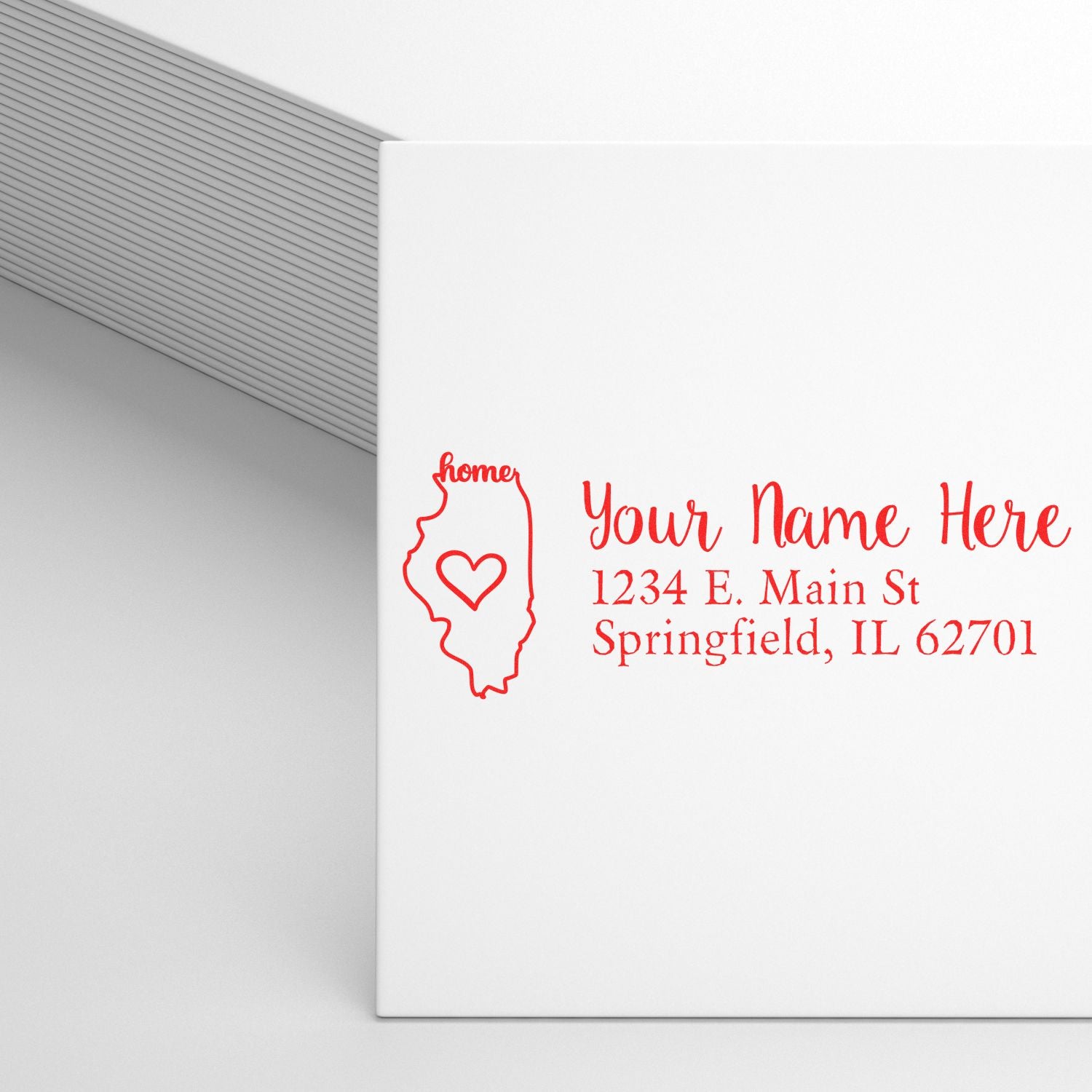 Custom Illinois return address rubber stamp with heart design for envelopes, featuring personalized name and mailing address.