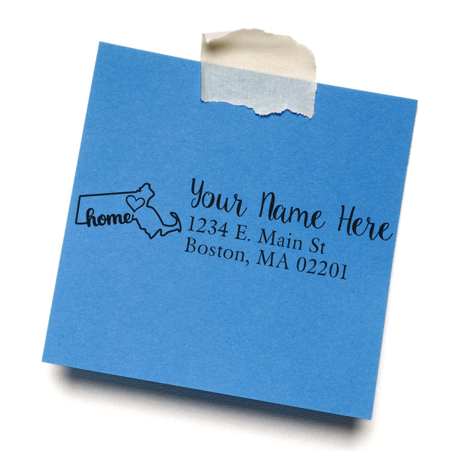 Custom home address rubber stamp with personalized name and Boston, MA return address on blue paper.