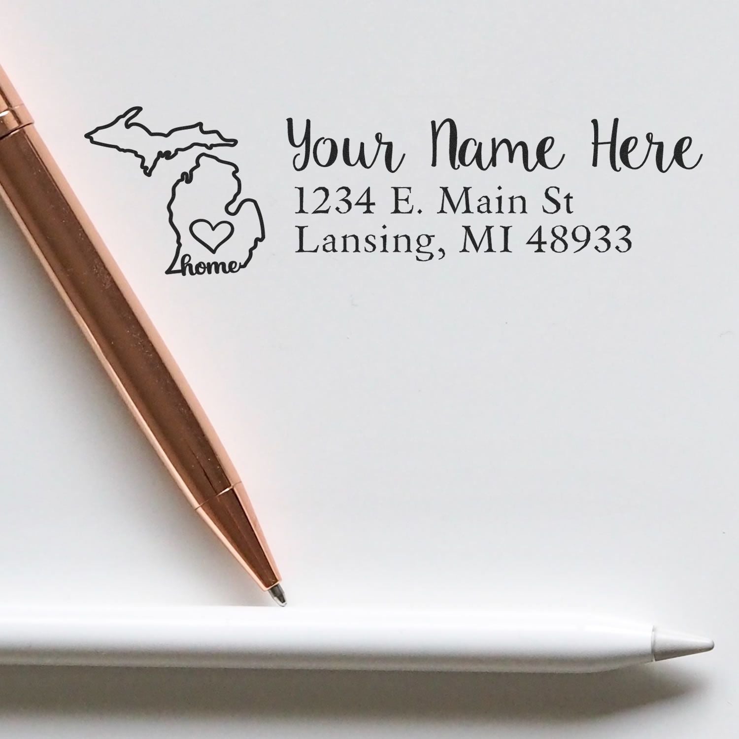 Personalized Michigan home return address rubber stamp with custom name and address for mailing and stationery.