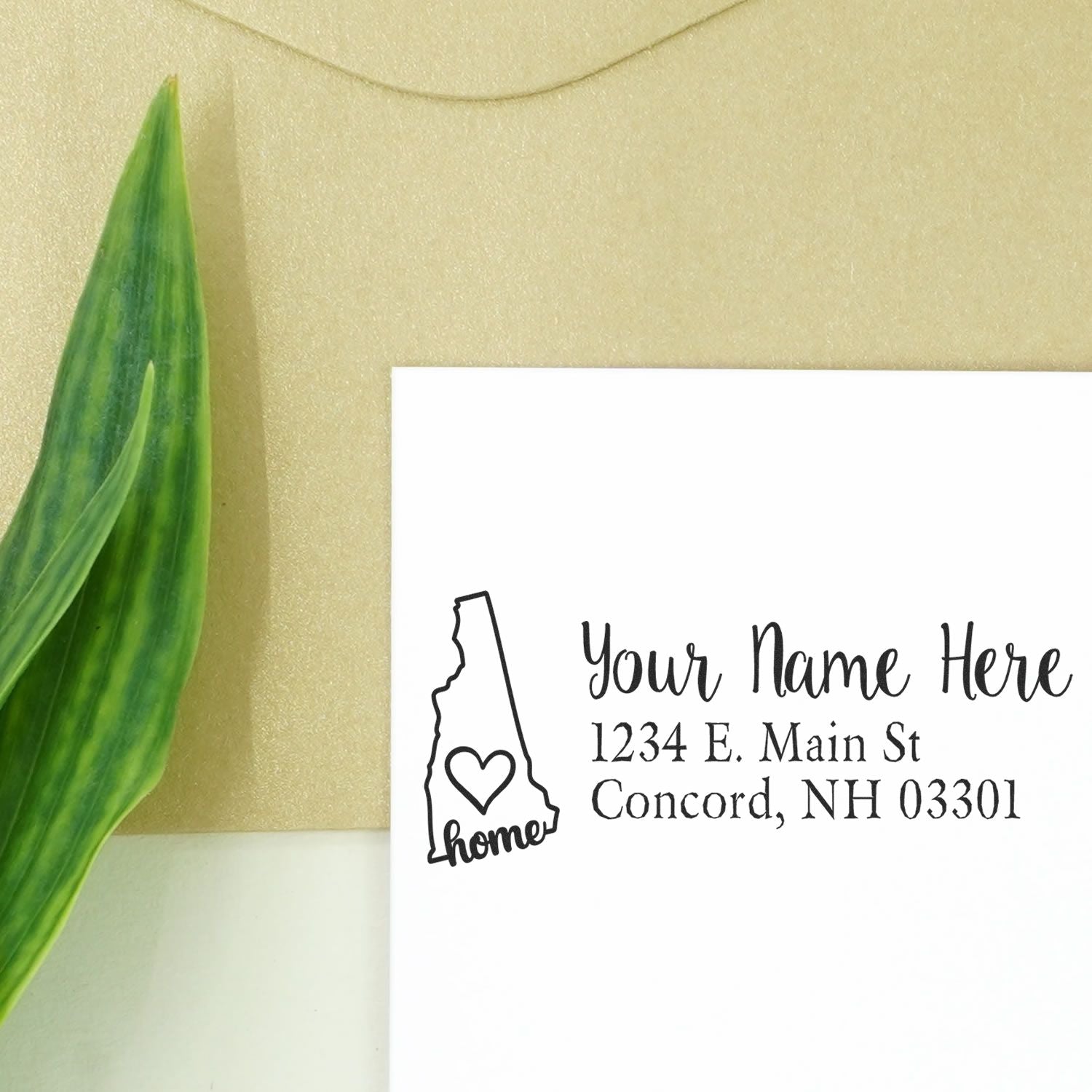 Custom New Hampshire return address rubber stamp with home icon, personalized for envelopes, stationery, and small business use.