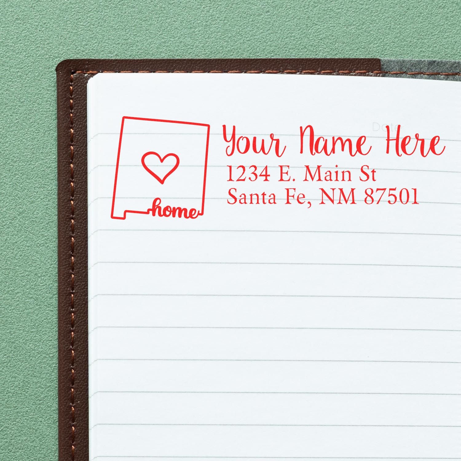 Personalized return address rubber stamp with heart and home icon for custom name and address labels.