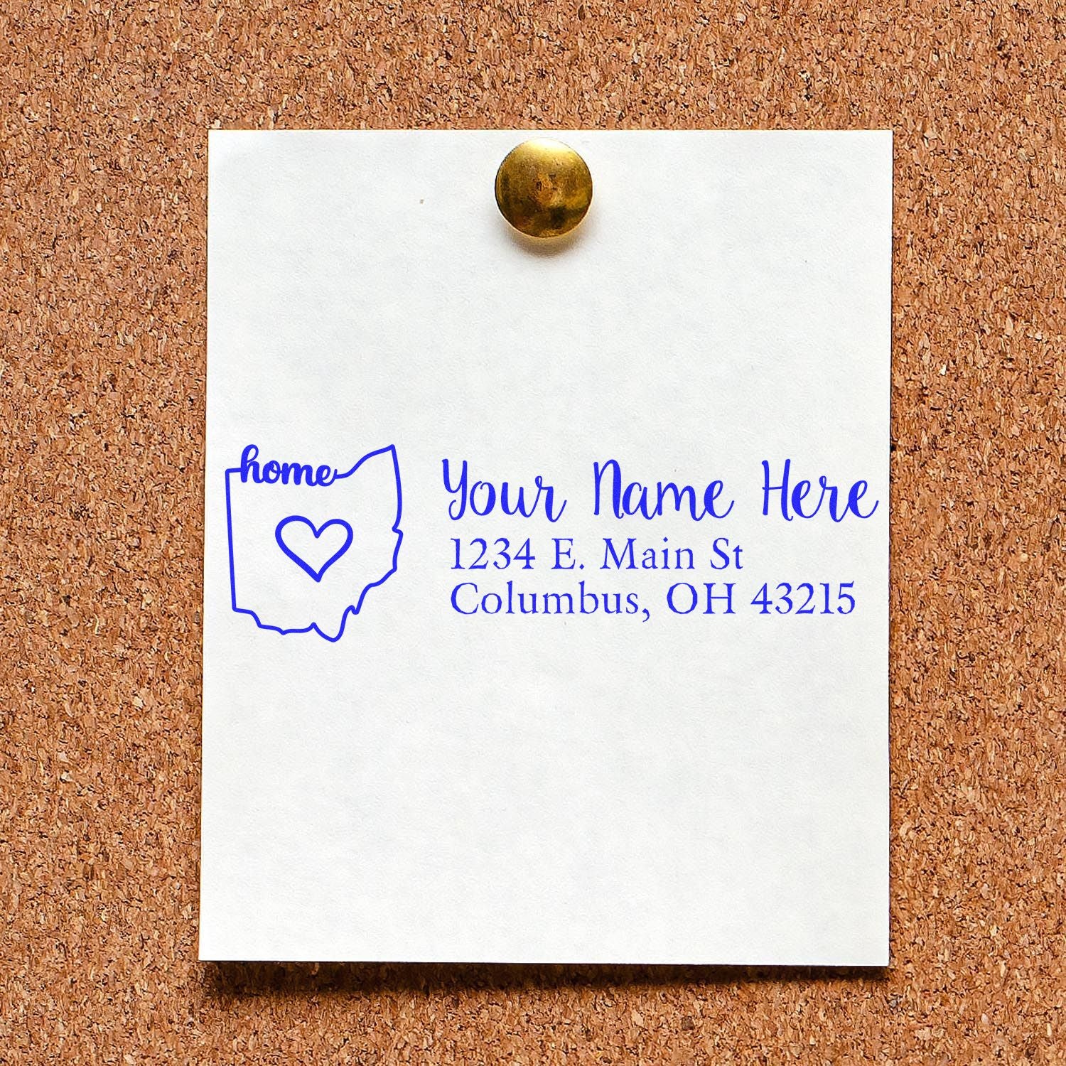 Custom return address rubber stamp with Ohio home outline and heart, featuring name and Columbus, OH address on note paper.