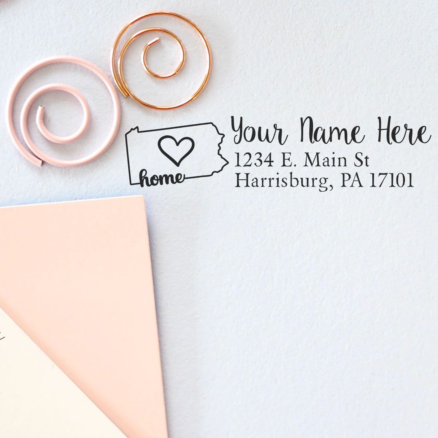 Custom return address rubber stamp with Pennsylvania home icon, personalized name and address design preview.
