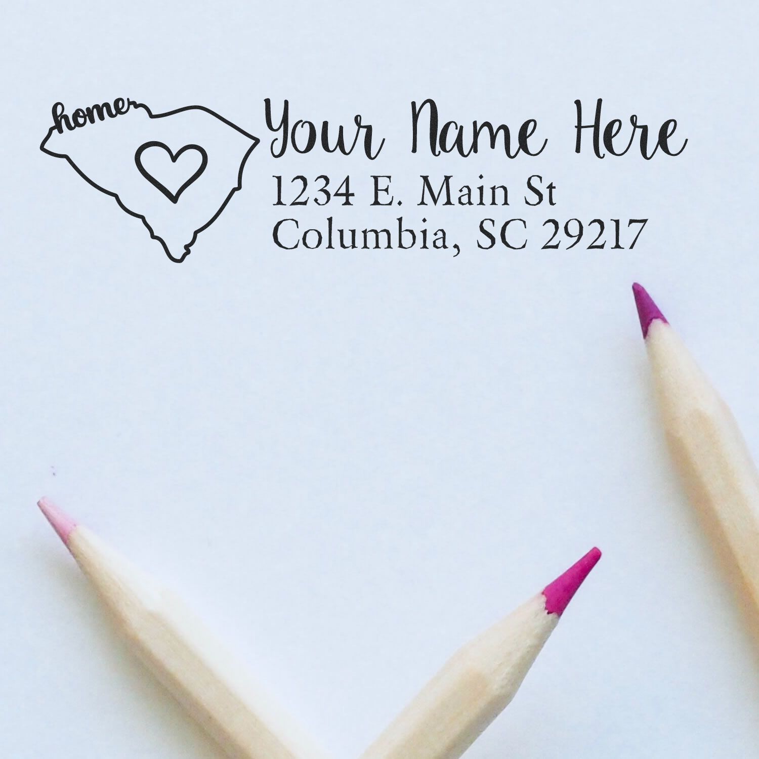 Custom South Carolina return address rubber stamp with heart design, personalized name, and address for mailing labels.