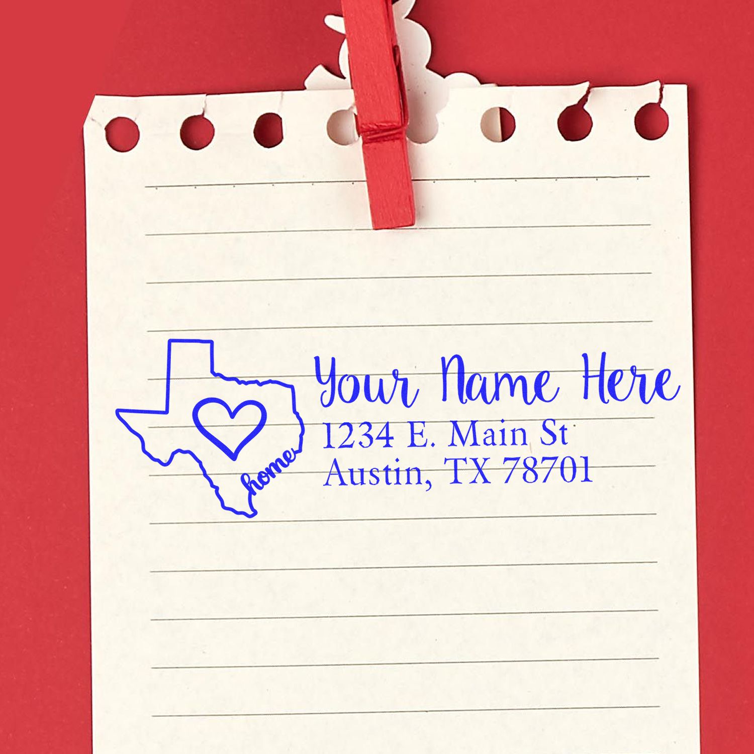 Custom Texas home address rubber stamp with heart, name, and Austin, TX return address on notepad.