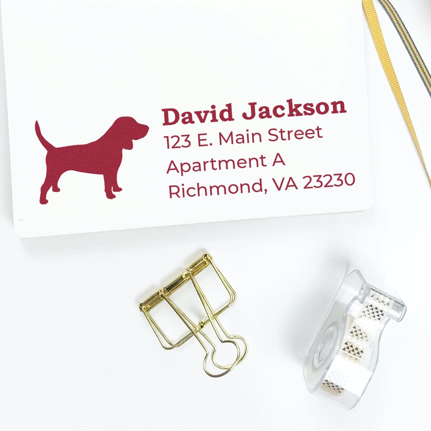 Personalized dog address rubber stamp with name and mailing address for custom stationery and envelopes.