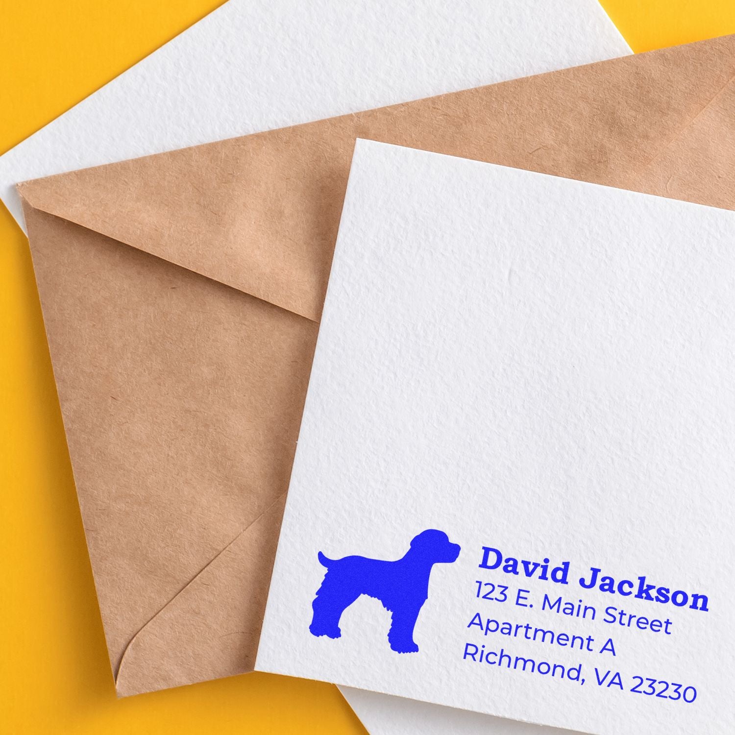 Custom return address rubber stamp with dog logo on envelopes for personalized mail and pet business branding.
