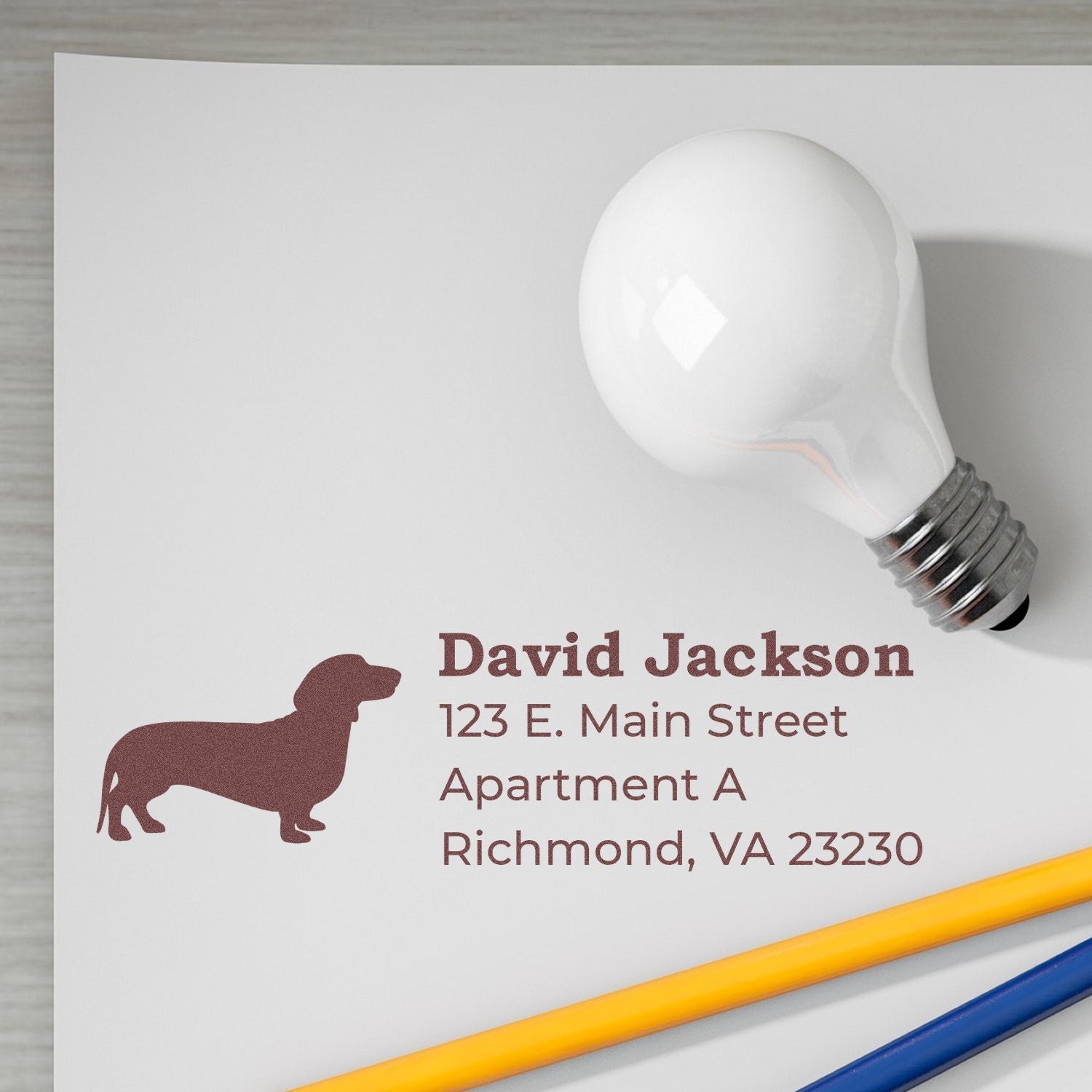 Custom rubber address stamp with dog silhouette and return address for David Jackson, Richmond, VA mailing labels.