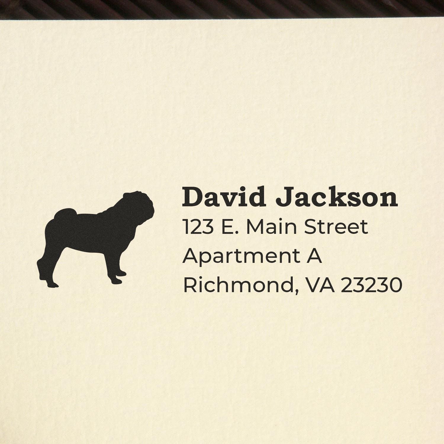 Custom address rubber stamp with dog silhouette for David Jackson, 123 E. Main Street, Apartment A, Richmond, VA 23230.