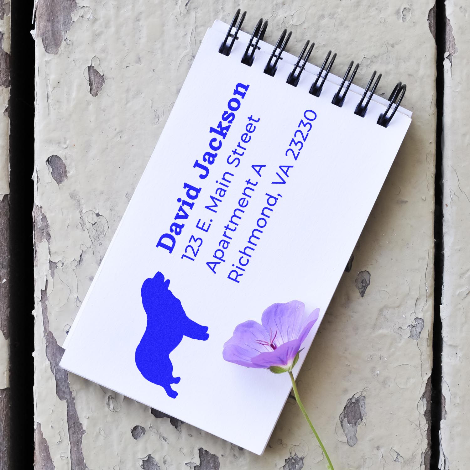 Custom address rubber stamp design with dog silhouette for David Jackson, 123 E Main St Apt A, Richmond, VA 23230.