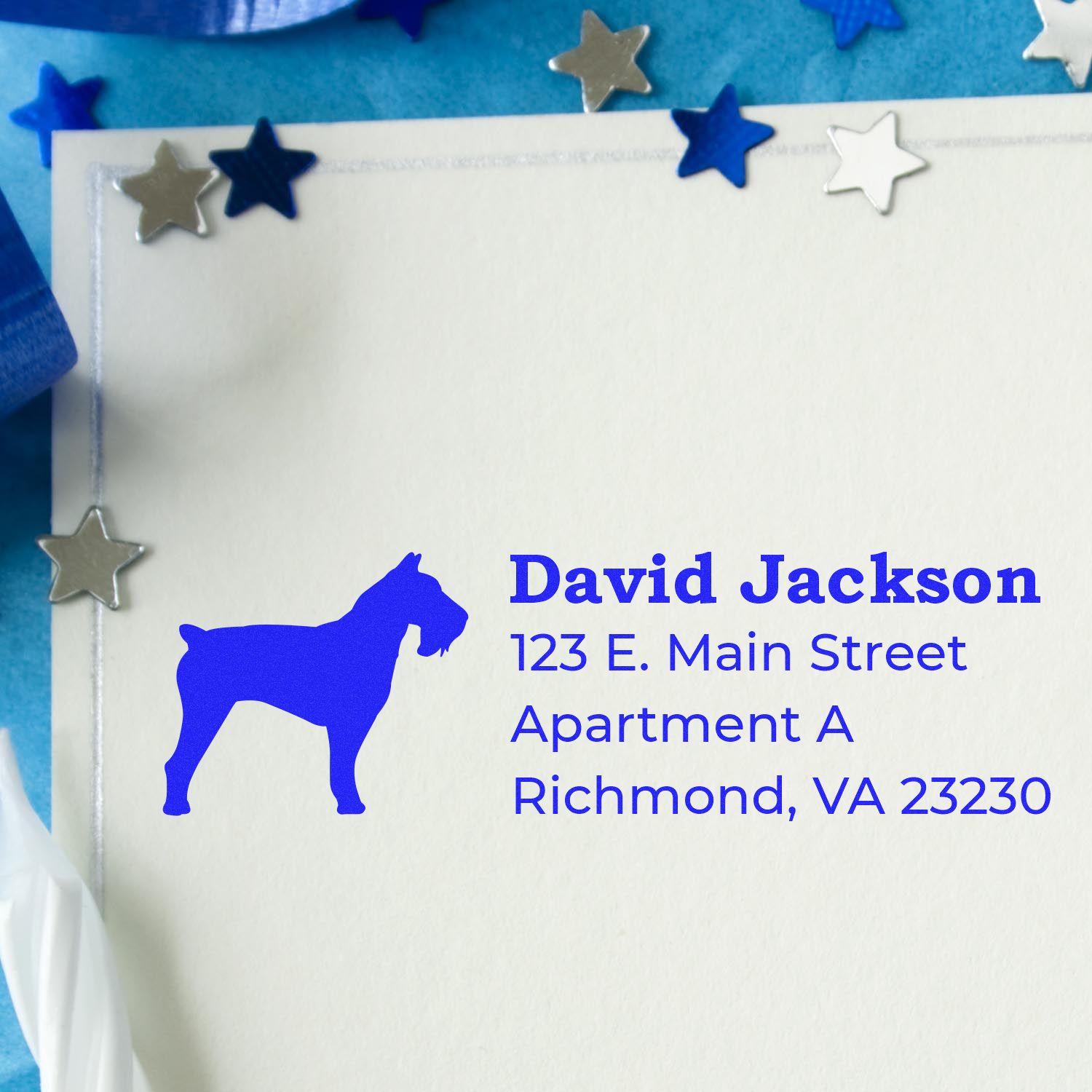 Custom dog silhouette address rubber stamp on envelope with blue star accents, personalized for David Jackson in Richmond, VA.