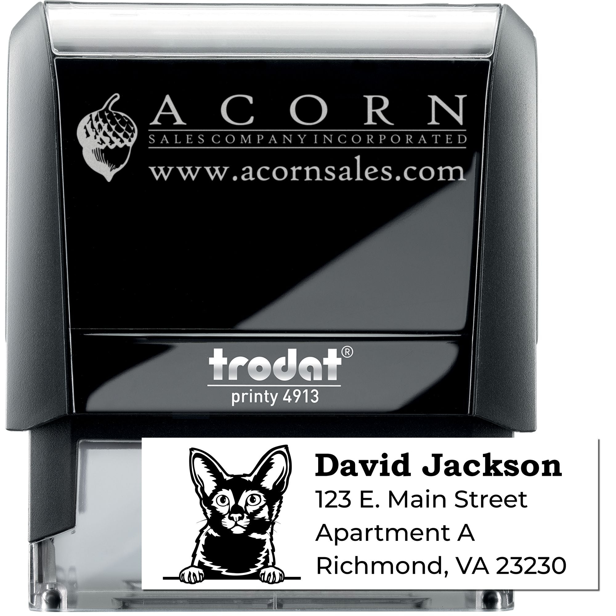 Custom self-inking rubber stamp with company logo and address imprint, ideal for business branding and mailing use.