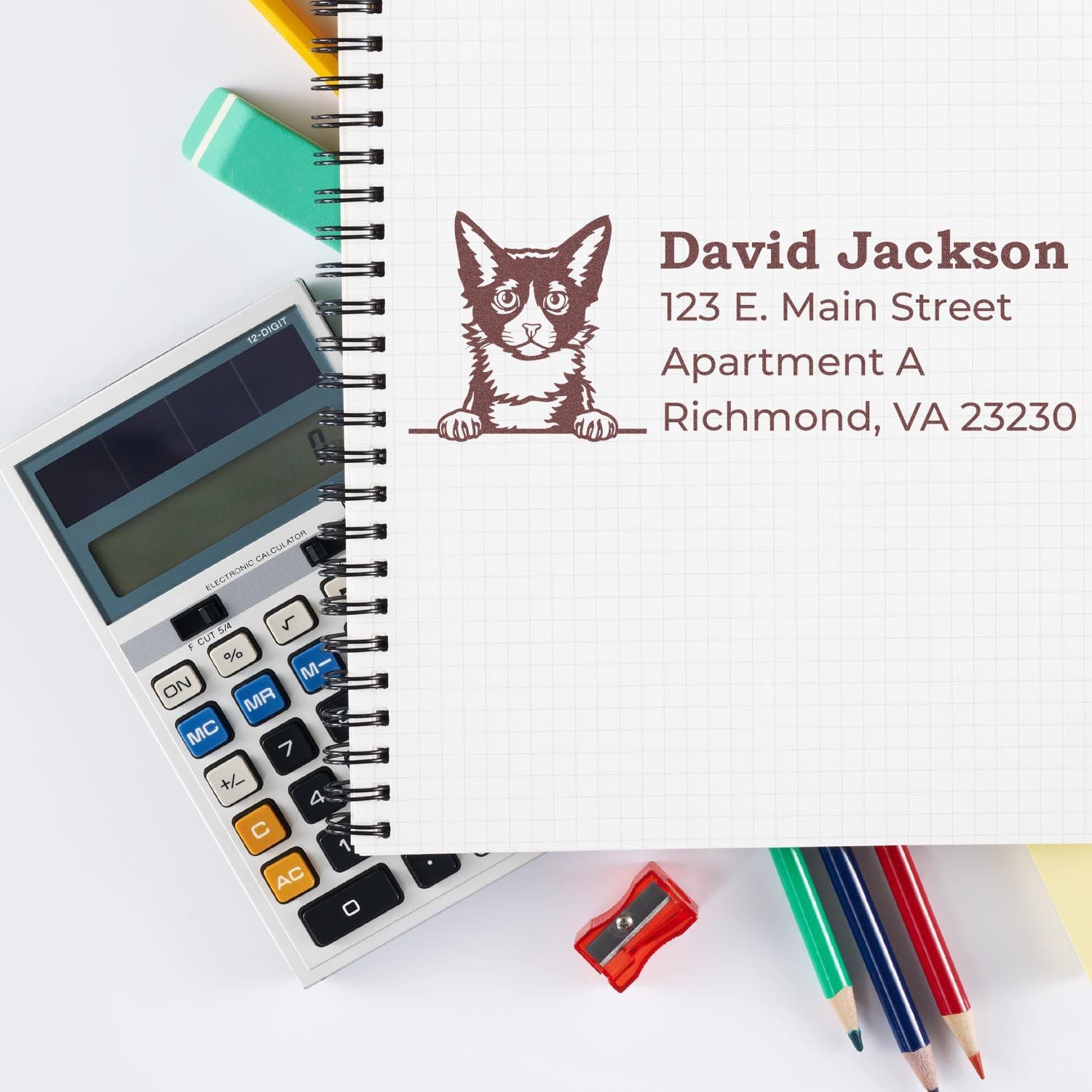 Custom cat address rubber stamp impression on notebook, featuring David Jackson name and Richmond, VA mailing address