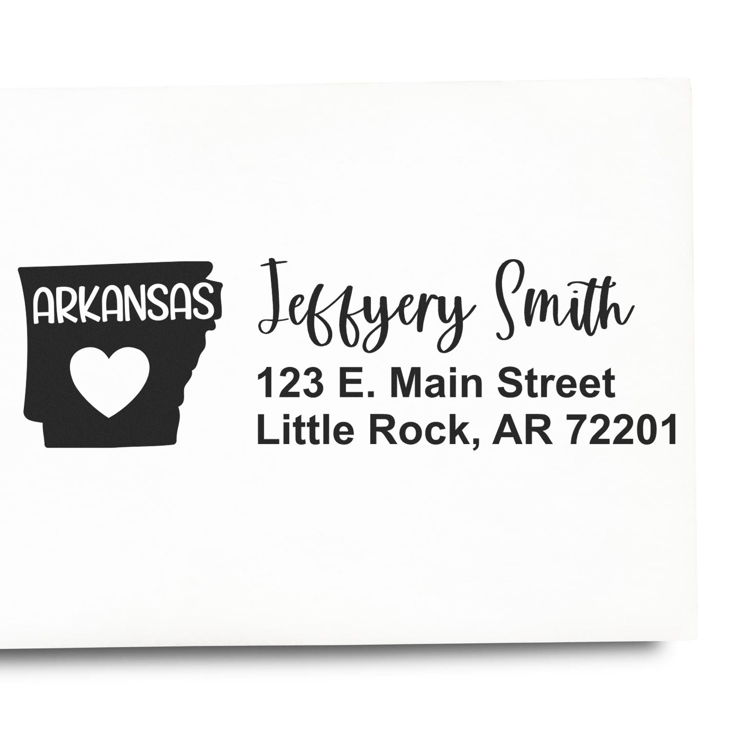 Custom Arkansas address rubber stamp with name and Little Rock, AR address, featuring state outline and heart.