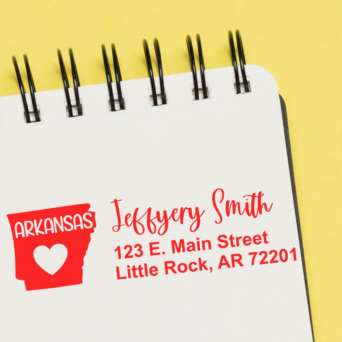 Custom Arkansas return address rubber stamp with heart icon, featuring Jeffery Smith and Little Rock, AR address on notebook.