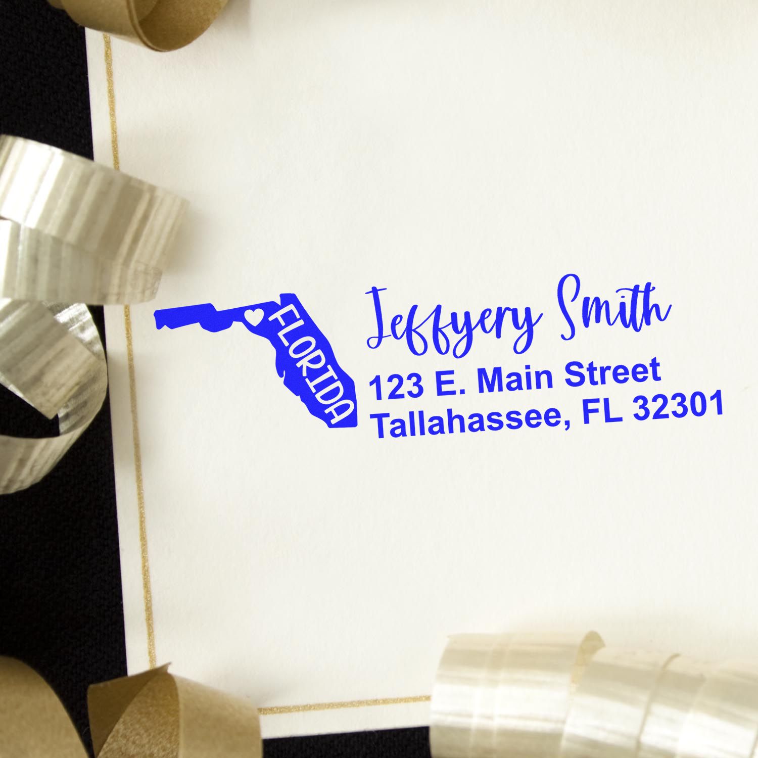 Custom Florida address rubber stamp for wedding invitations with name and Tallahassee mailing address.
