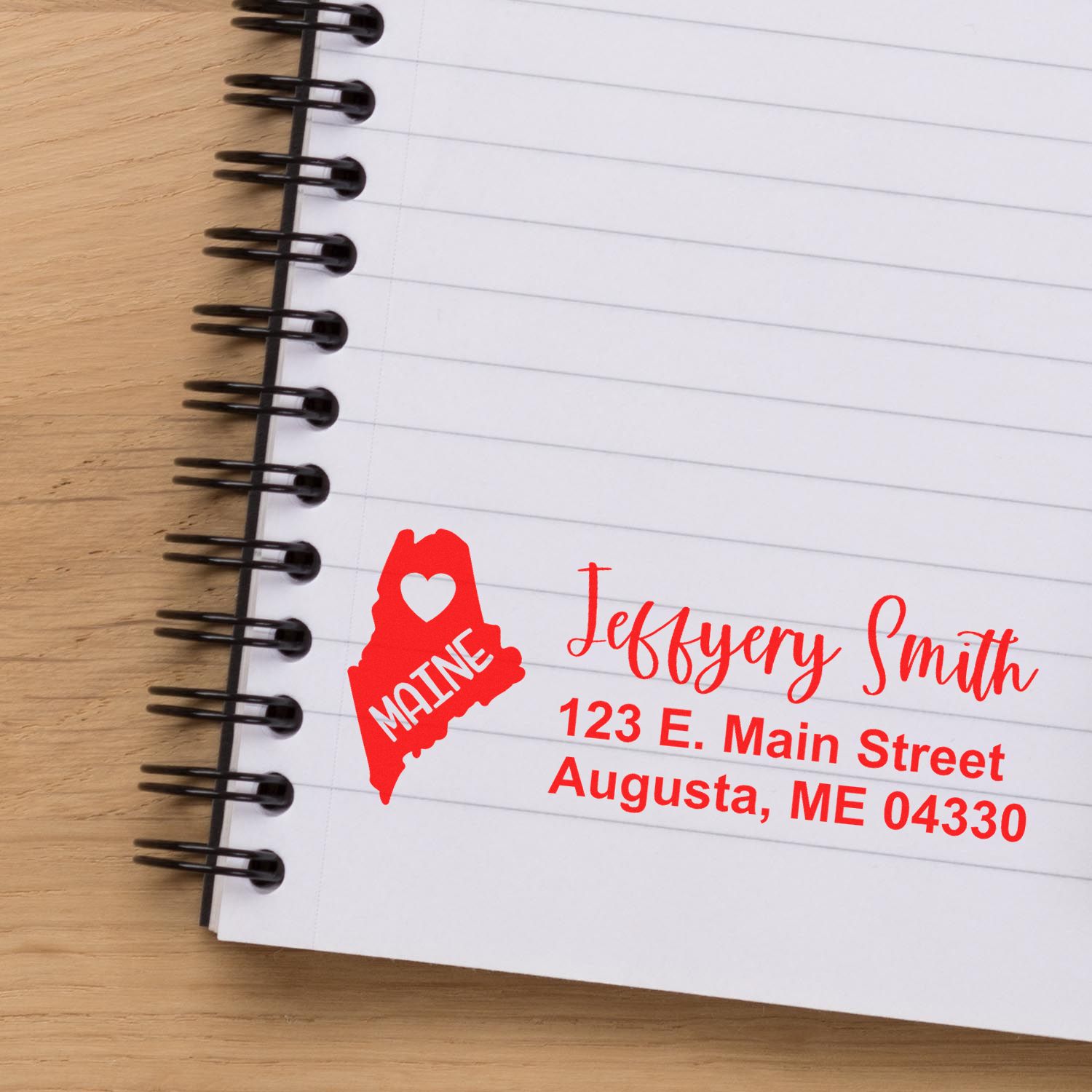 Custom Maine return address rubber stamp with heart state outline for Jeffrey Smith, Augusta, ME address.