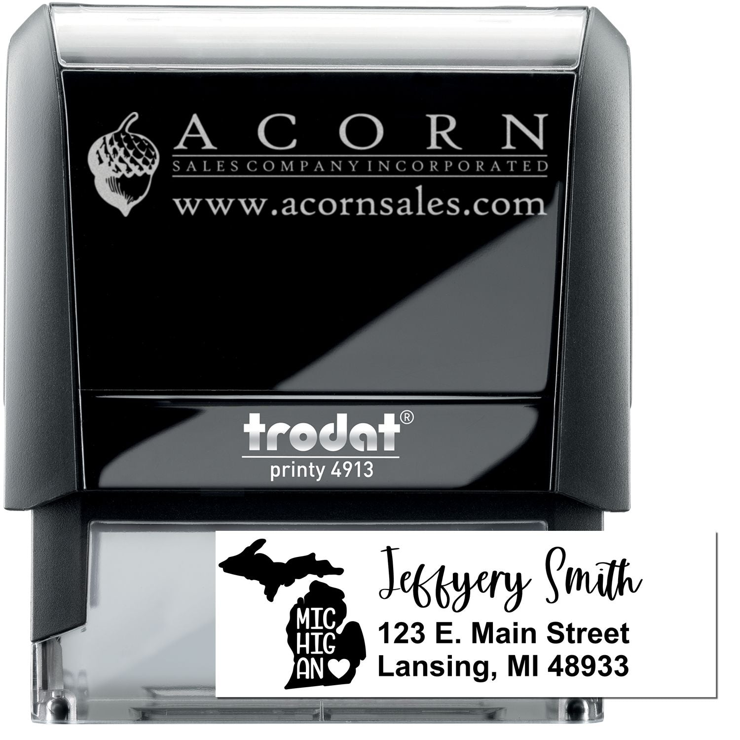 Custom Trodat Printy 4913 self-inking rubber stamp with logo and address imprint for business mailing.