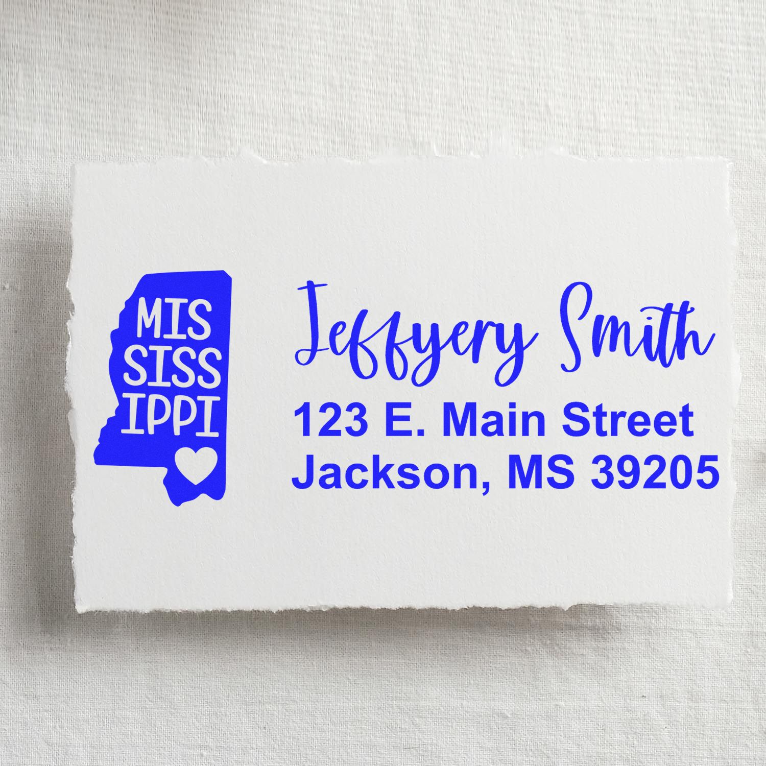 Personalized Mississippi return address rubber stamp with name, street address, and state silhouette design.