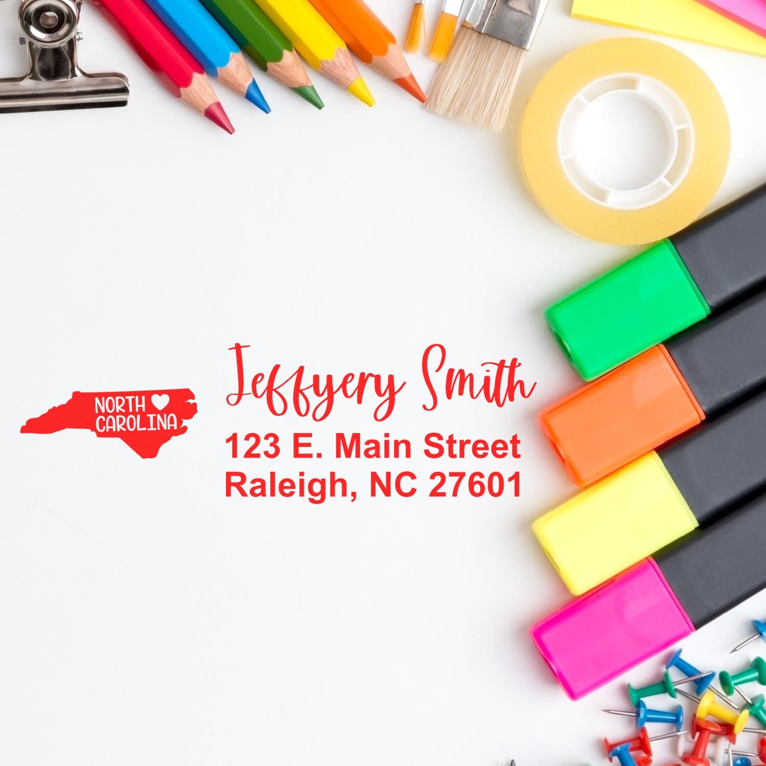 Custom self-inking rubber address stamp with North Carolina design, name, and Raleigh, NC return address.