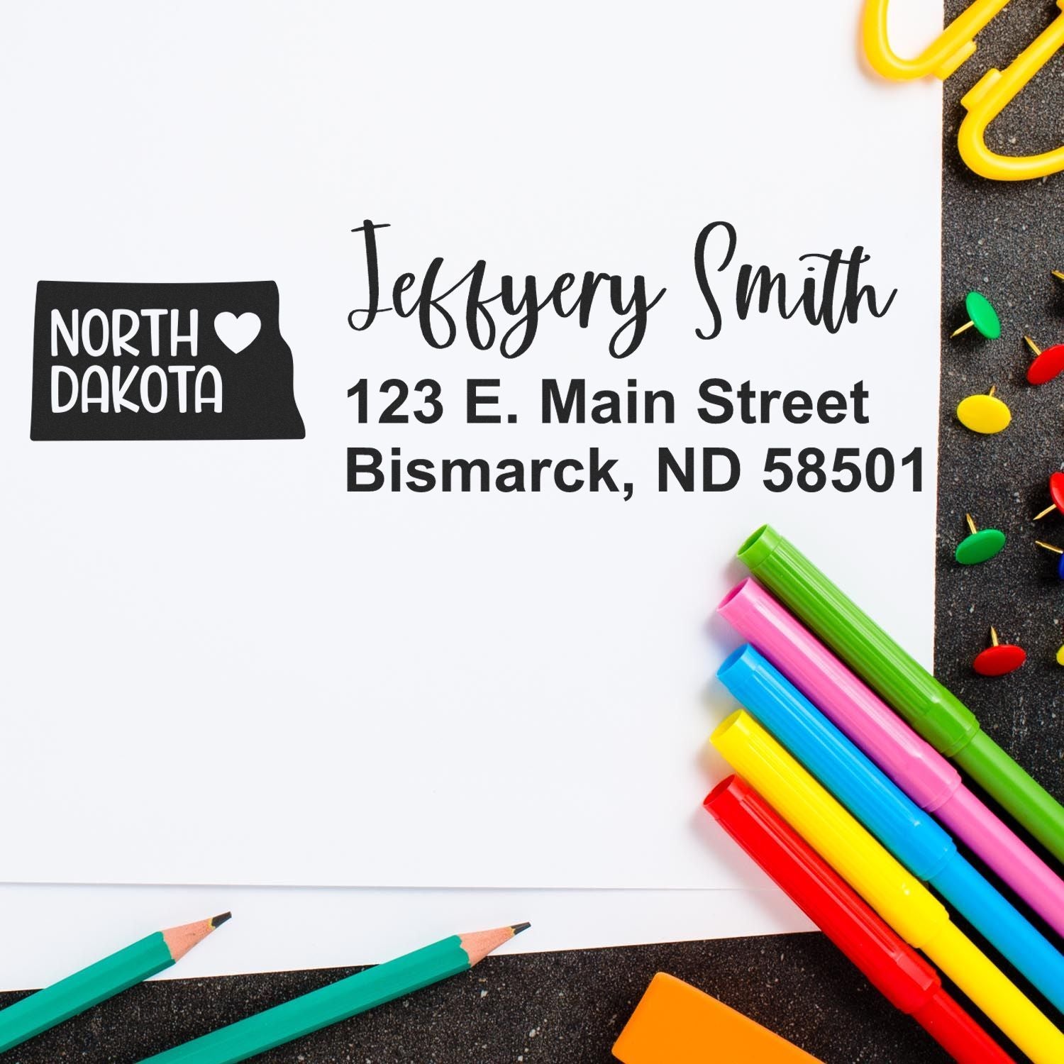 Personalized custom rubber address stamp with North Dakota design, featuring Jeffery Smith and Bismarck, ND 58501