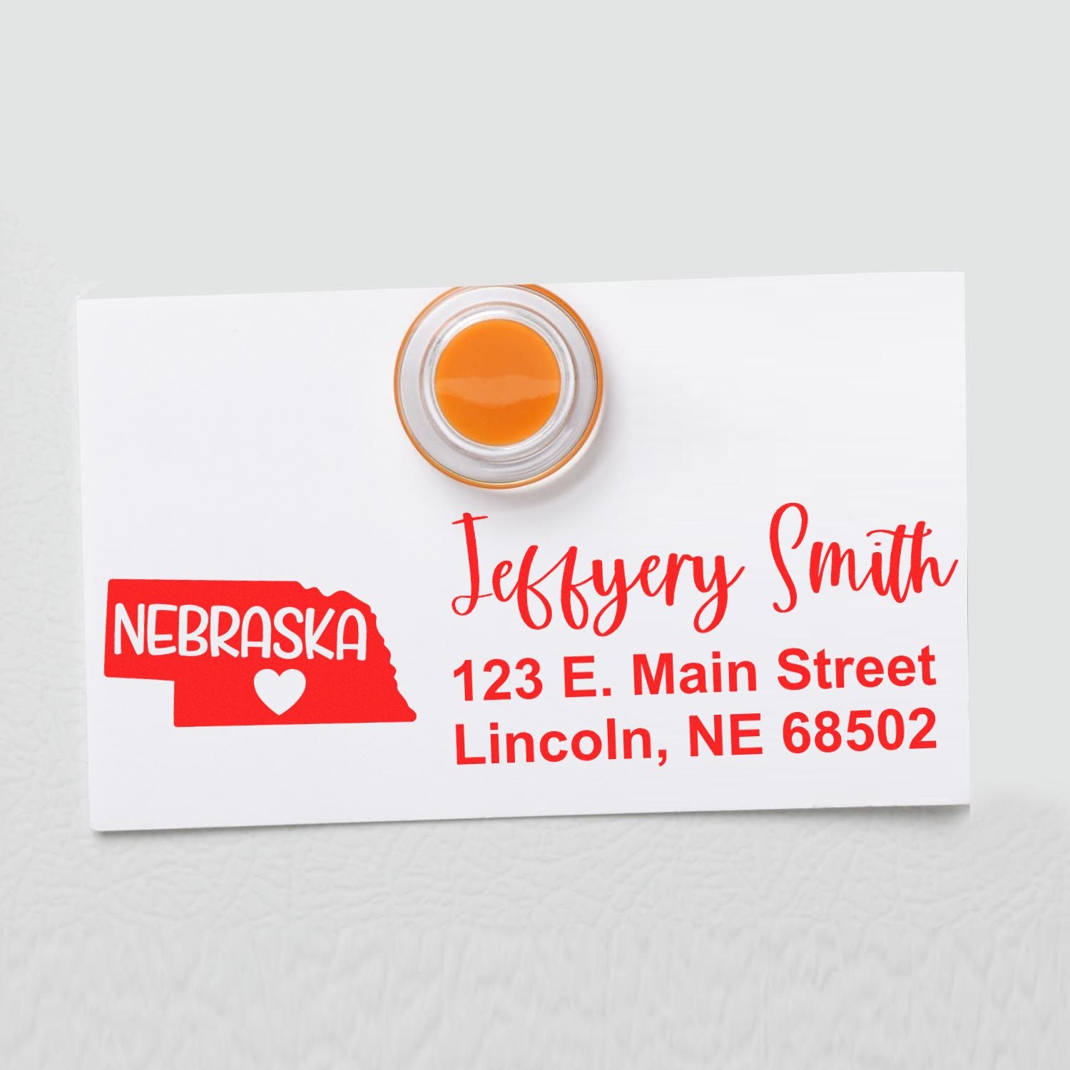 Custom Nebraska return address rubber stamp with personalized name, street address, and Lincoln, NE ZIP code.