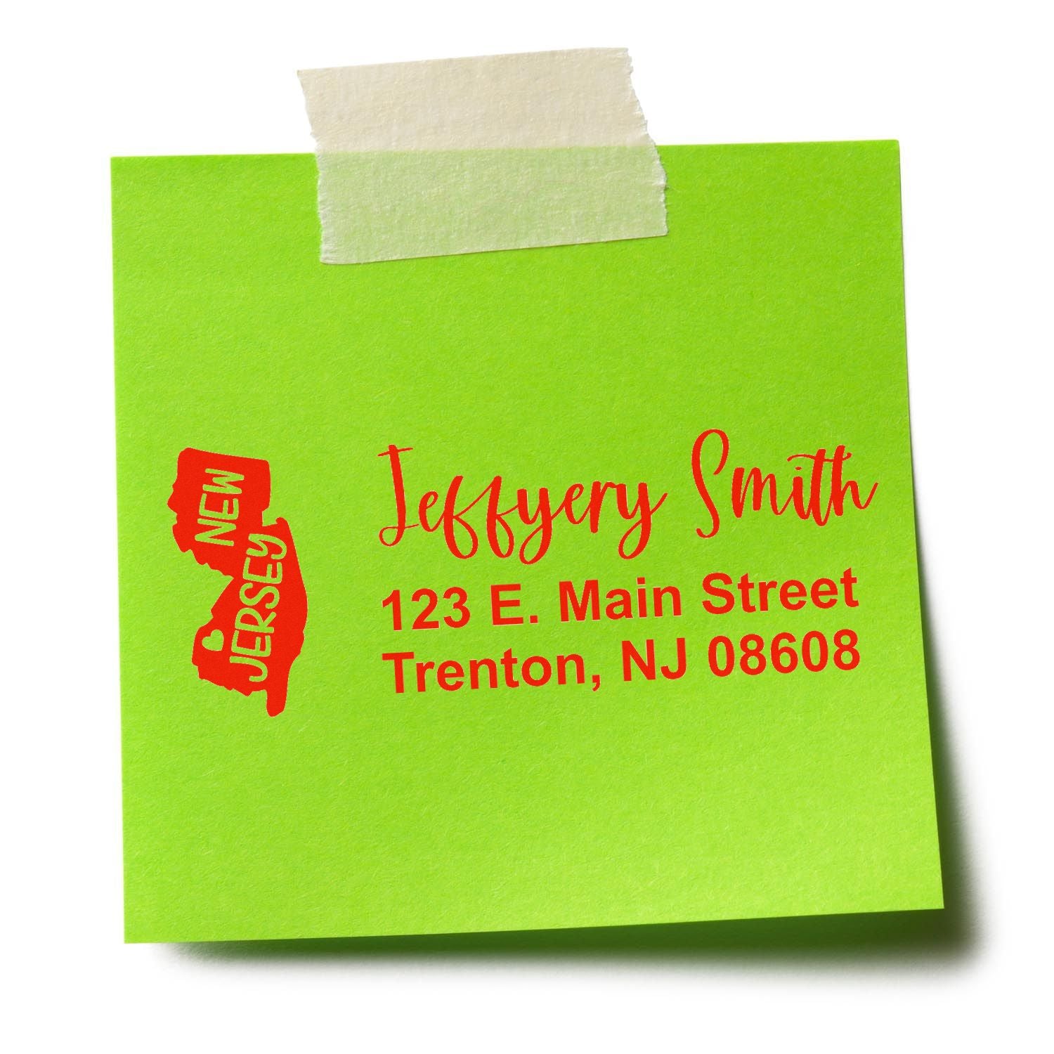 Personalized address rubber stamp with New Jersey outline, name, and Trenton, NJ return address on a green note.