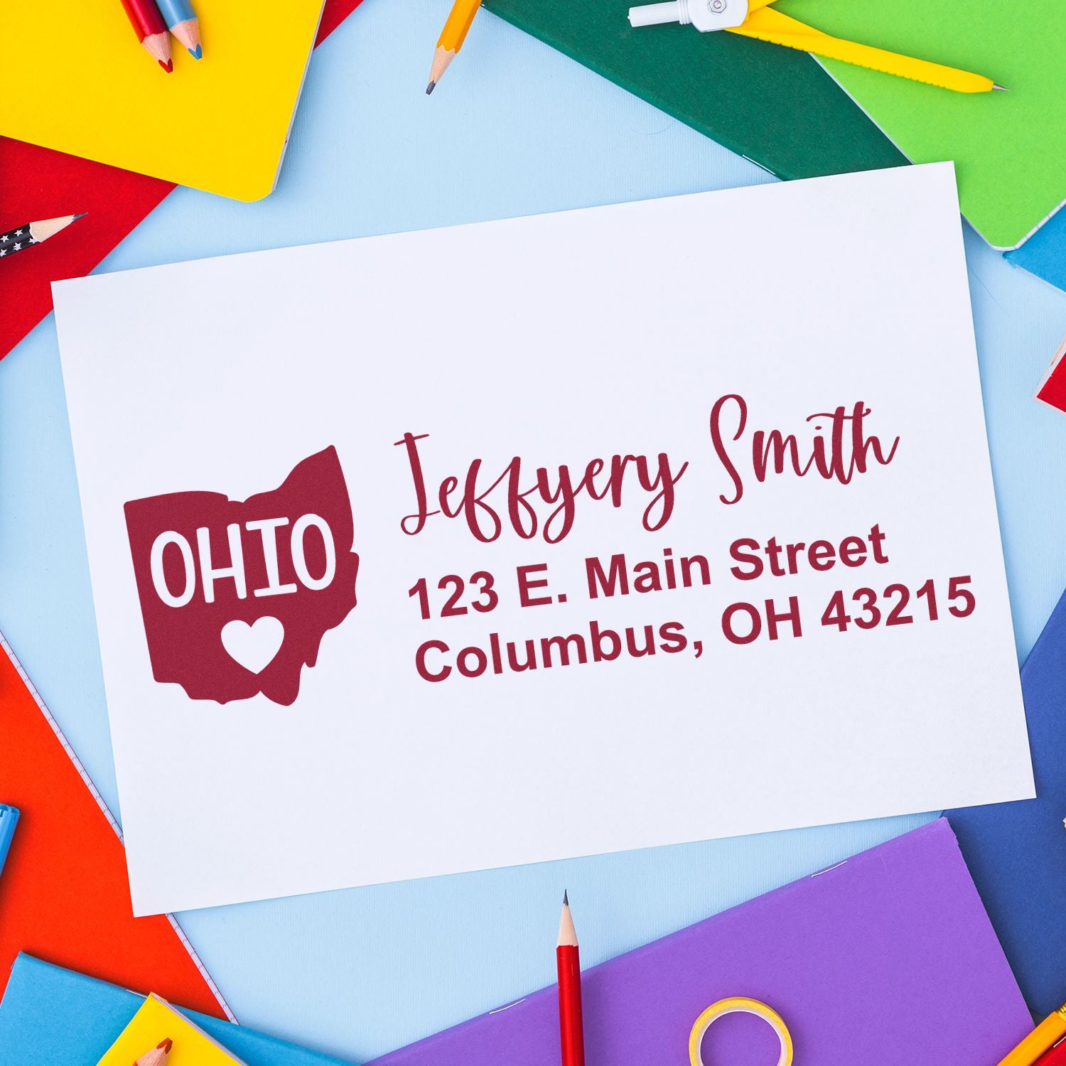 Custom Ohio return address rubber stamp with name and Columbus, OH mailing address for personalized envelopes and stationery.