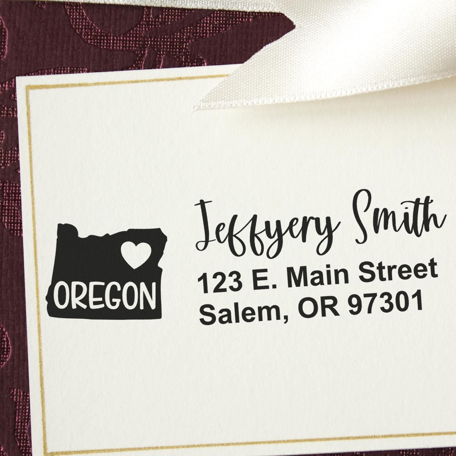 Custom Oregon return address rubber stamp on envelope with name and Salem, OR mailing address