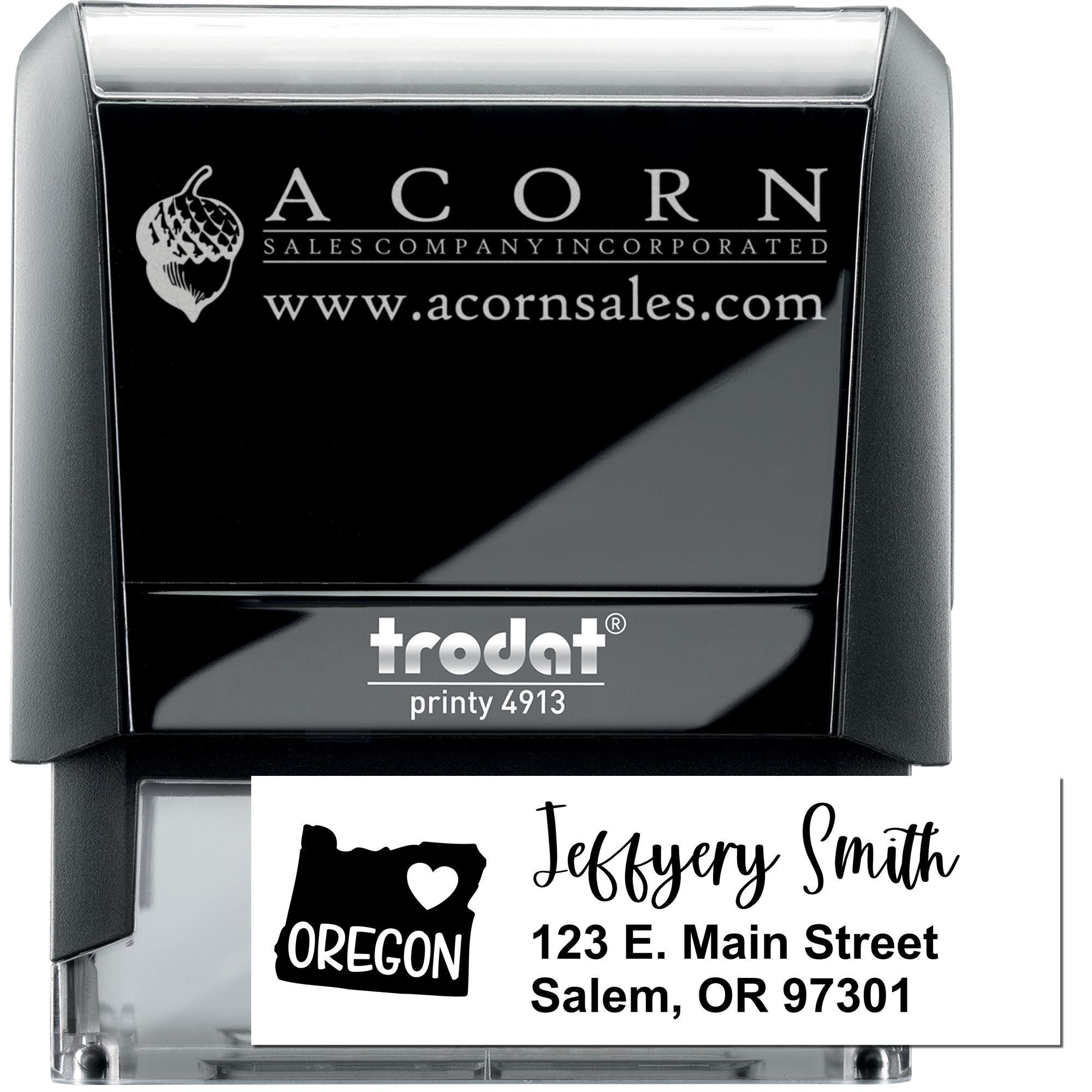 Custom self-inking rubber stamp with personalized Oregon address and logo for business branding and mailing.