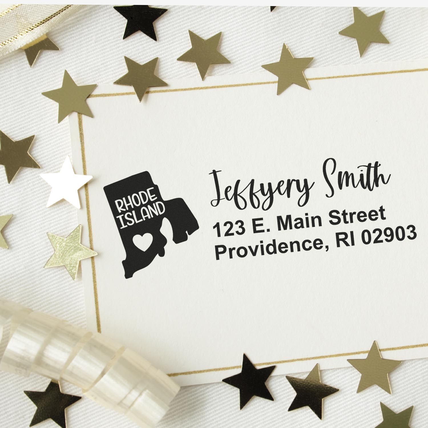 Personalized Rhode Island return address rubber stamp with name, address, and state icon for wedding invitations.