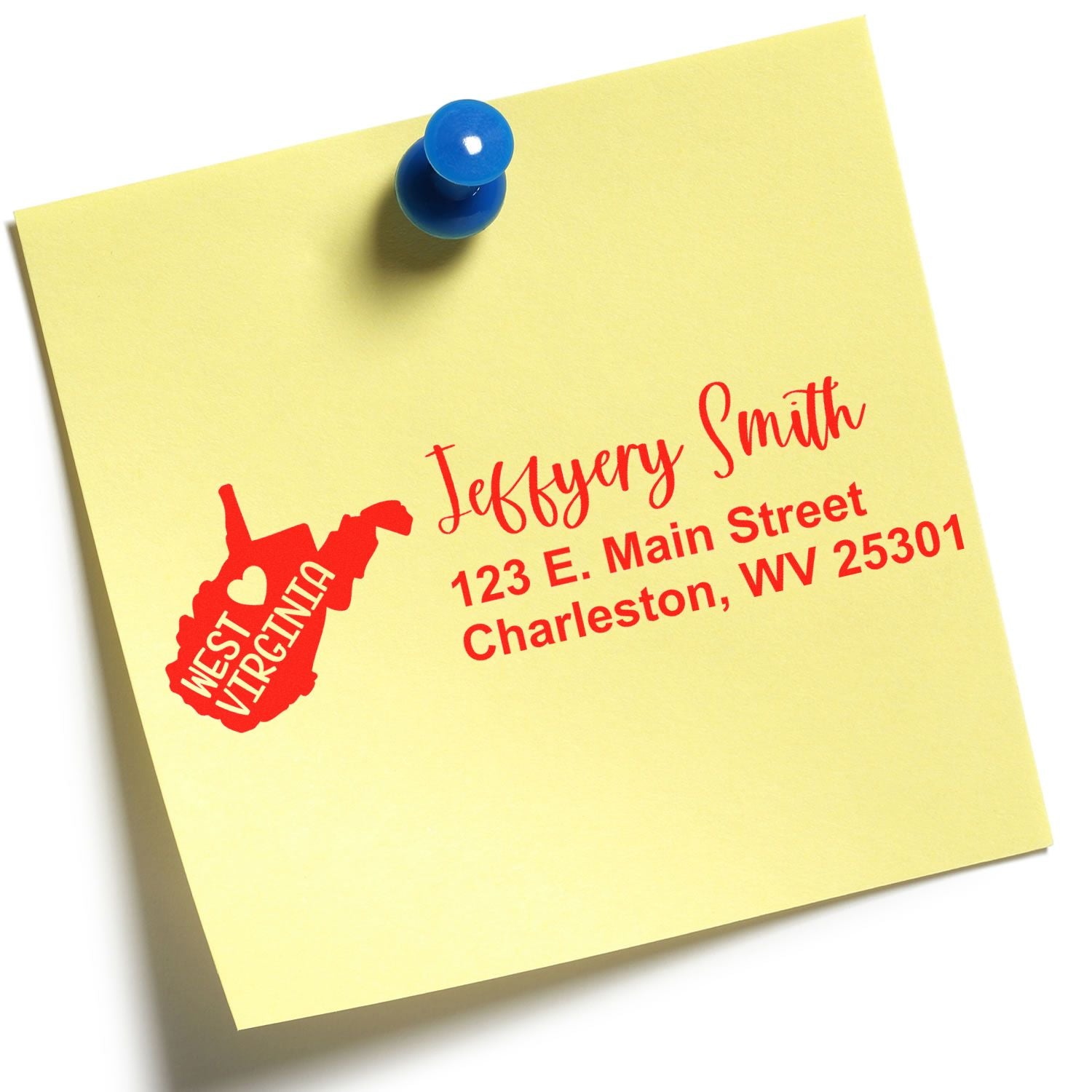 Custom return address rubber stamp with West Virginia state design on a sticky note, featuring name and Charleston, WV address.